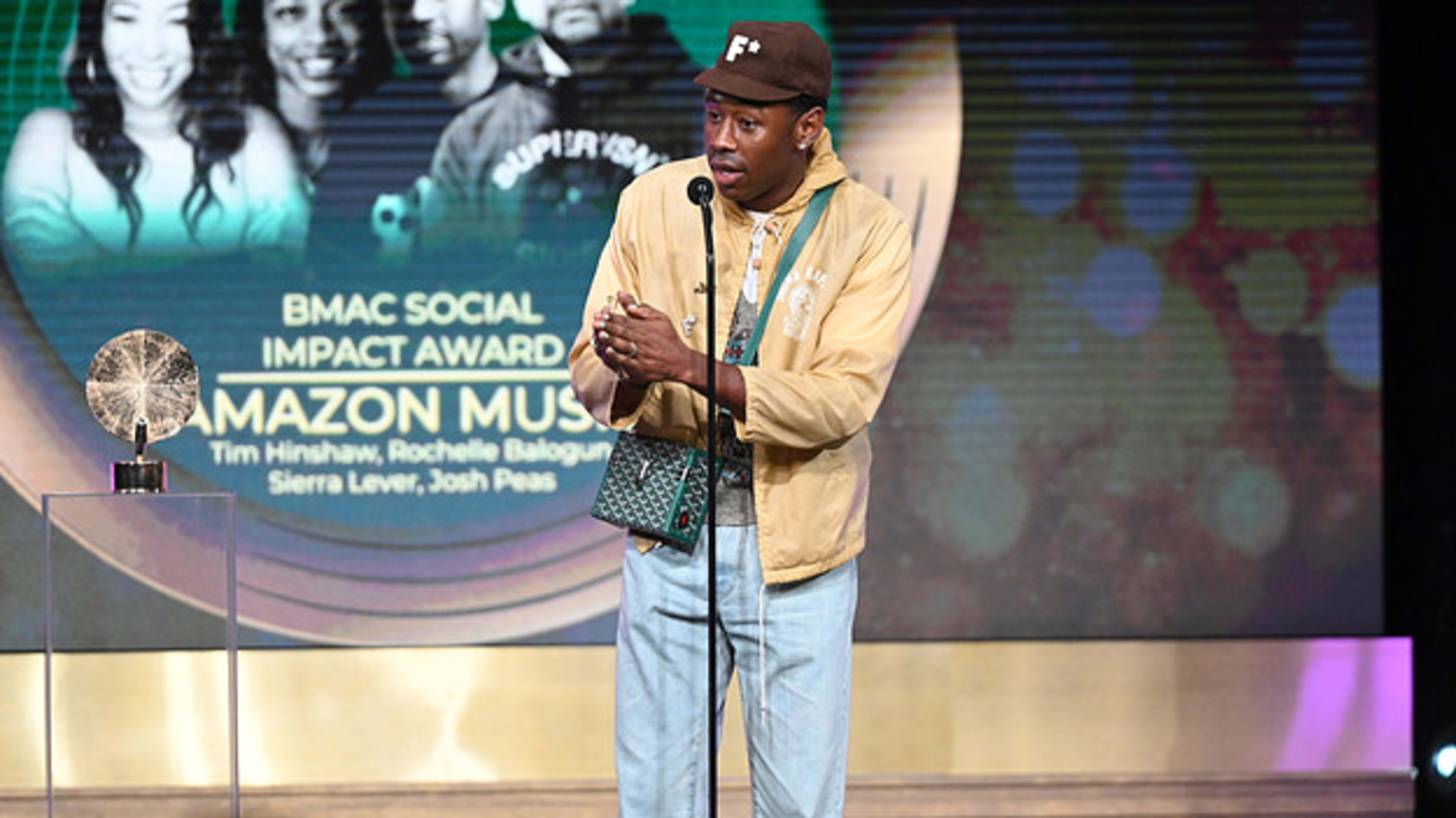 Tyler the Creator is seen giving a speech