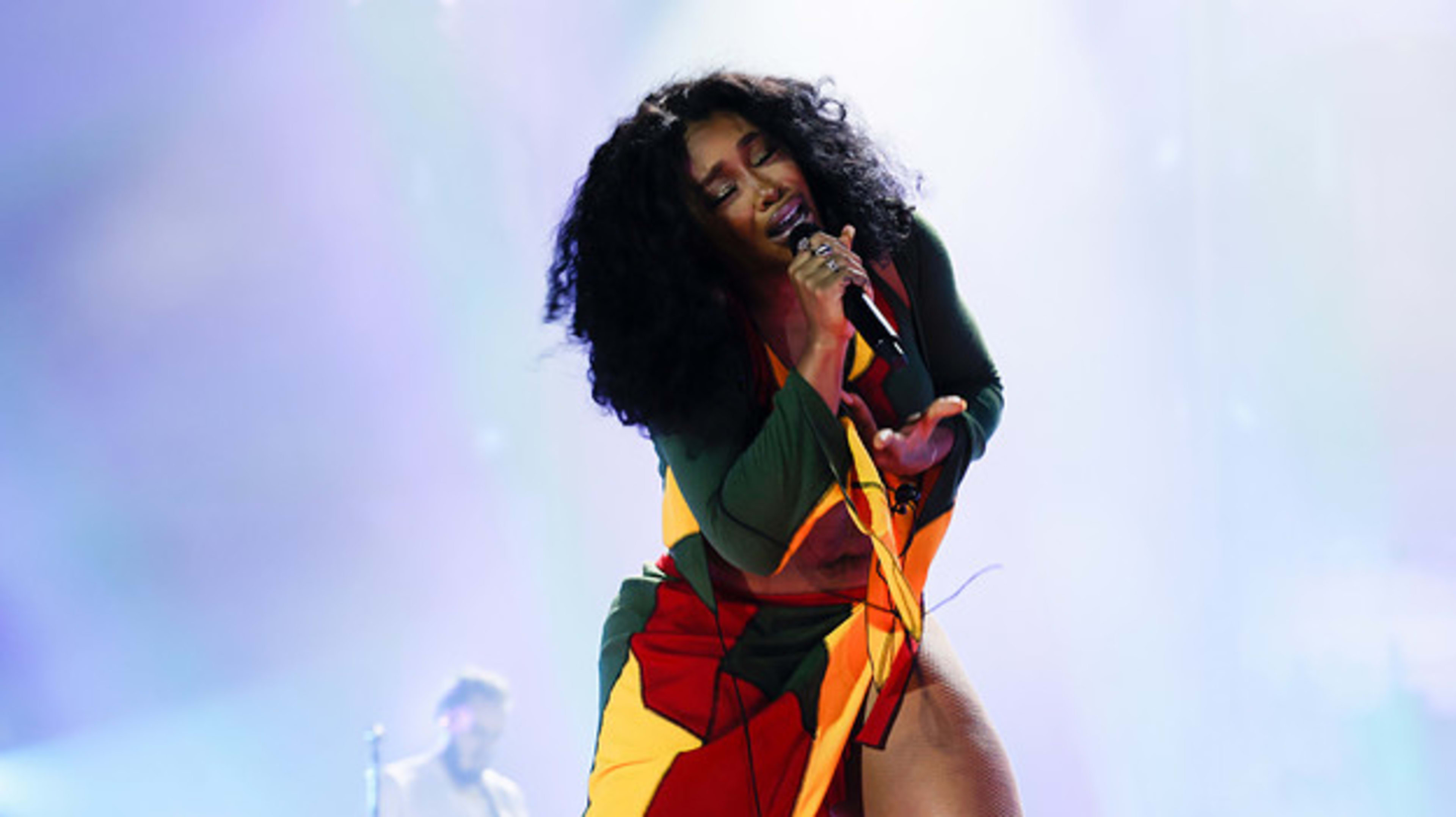 SZA is seen performing live