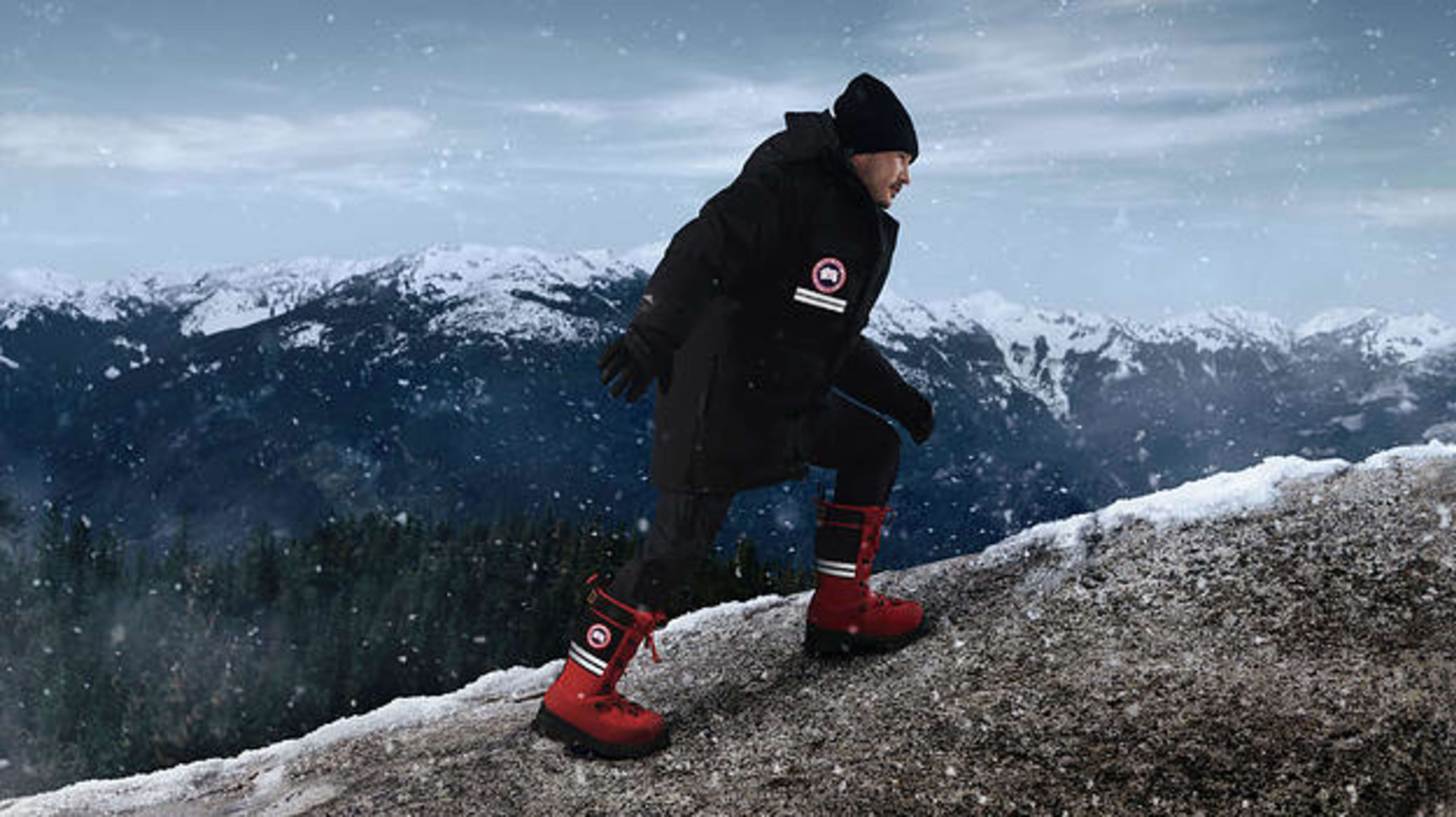 NHL alumni Jordin Tootoo hiking up a mountain in Canada Goose's new footwear