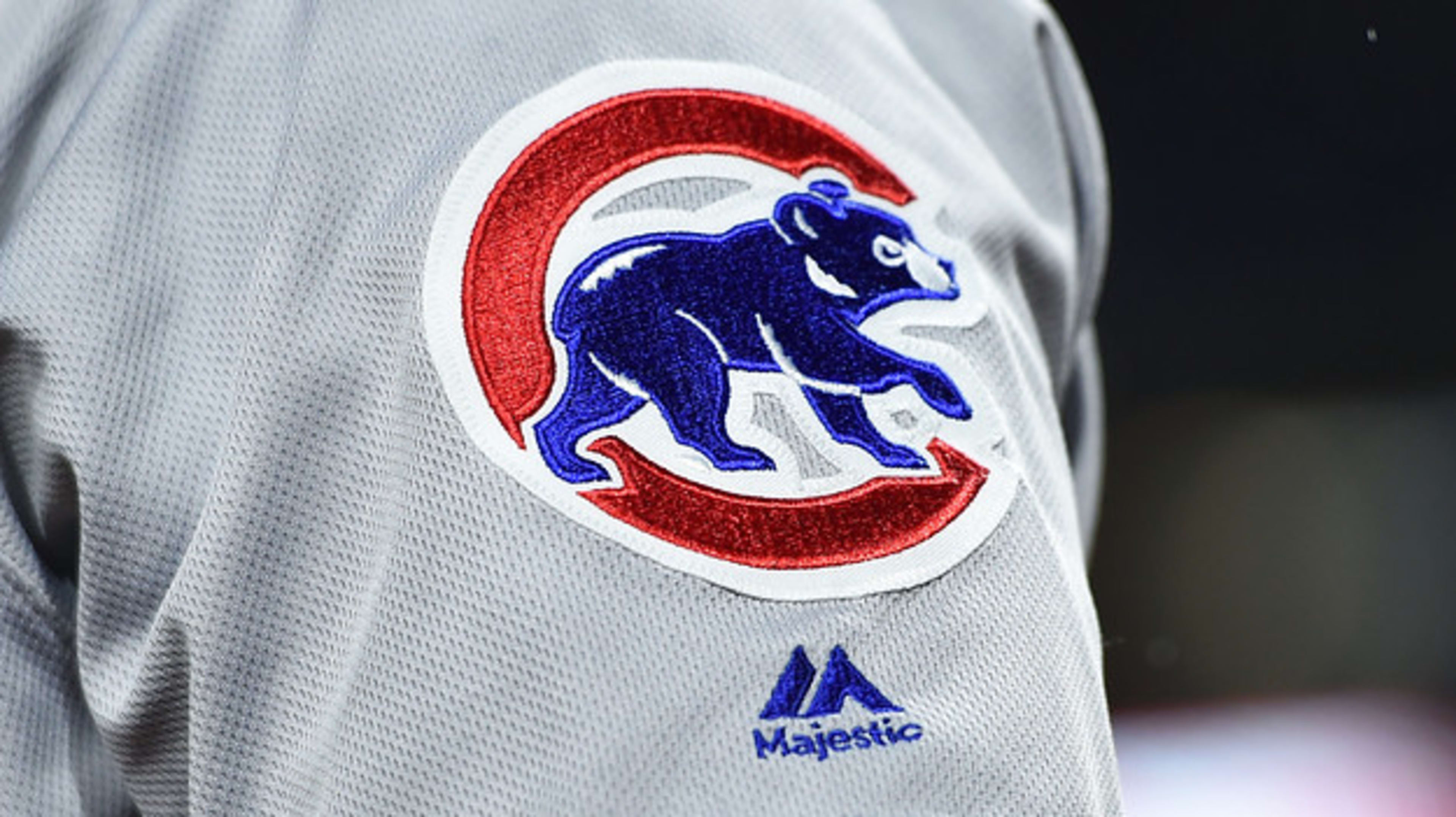 Chicago Cubs logo is displayed on the Majestic jersey.