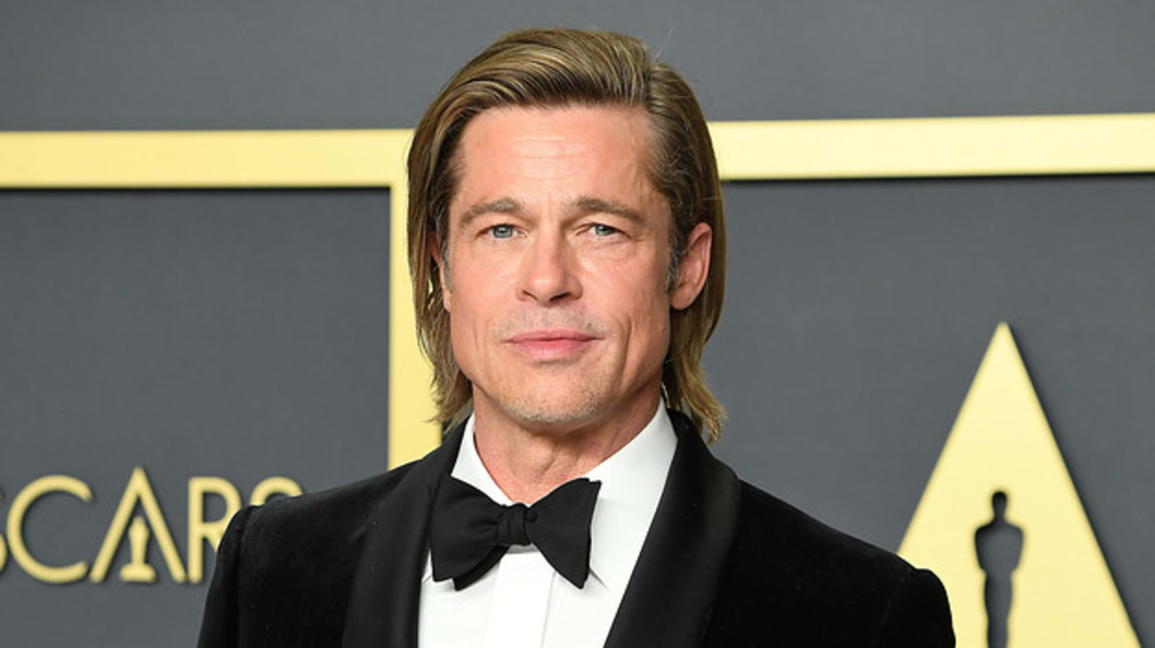 Brad Pitt poses at the 92nd Annual Academy Awards