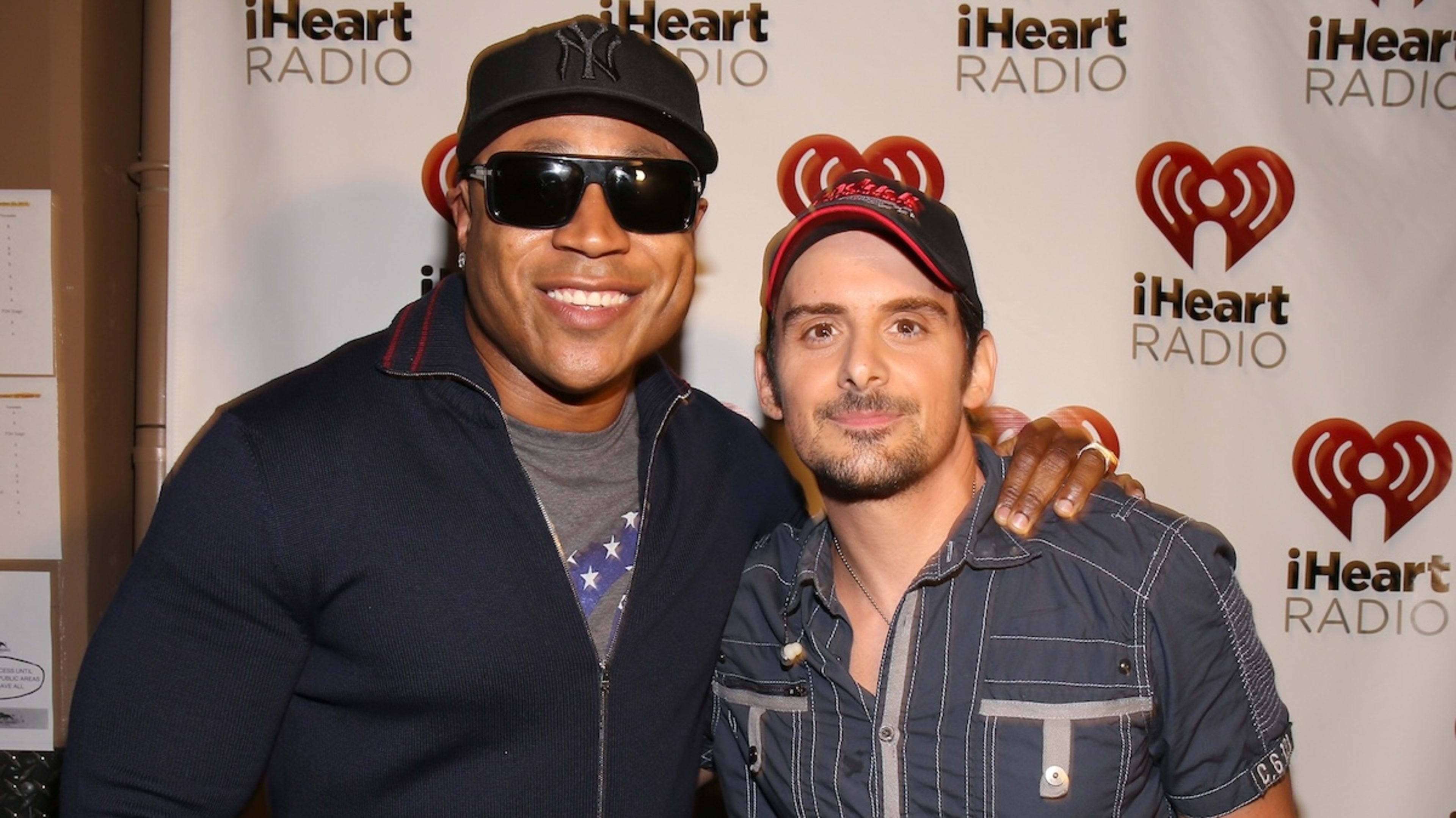 LAS VEGAS, NV - SEPTEMBER 22: Actor/rapper LL Cool J (L) and recording artist Brad Paisley appear backstage during the 2012 iHeartRadio Music Festival at the MGM Grand Garden Arena on September 22, 2012 in Las Vegas, Nevada.