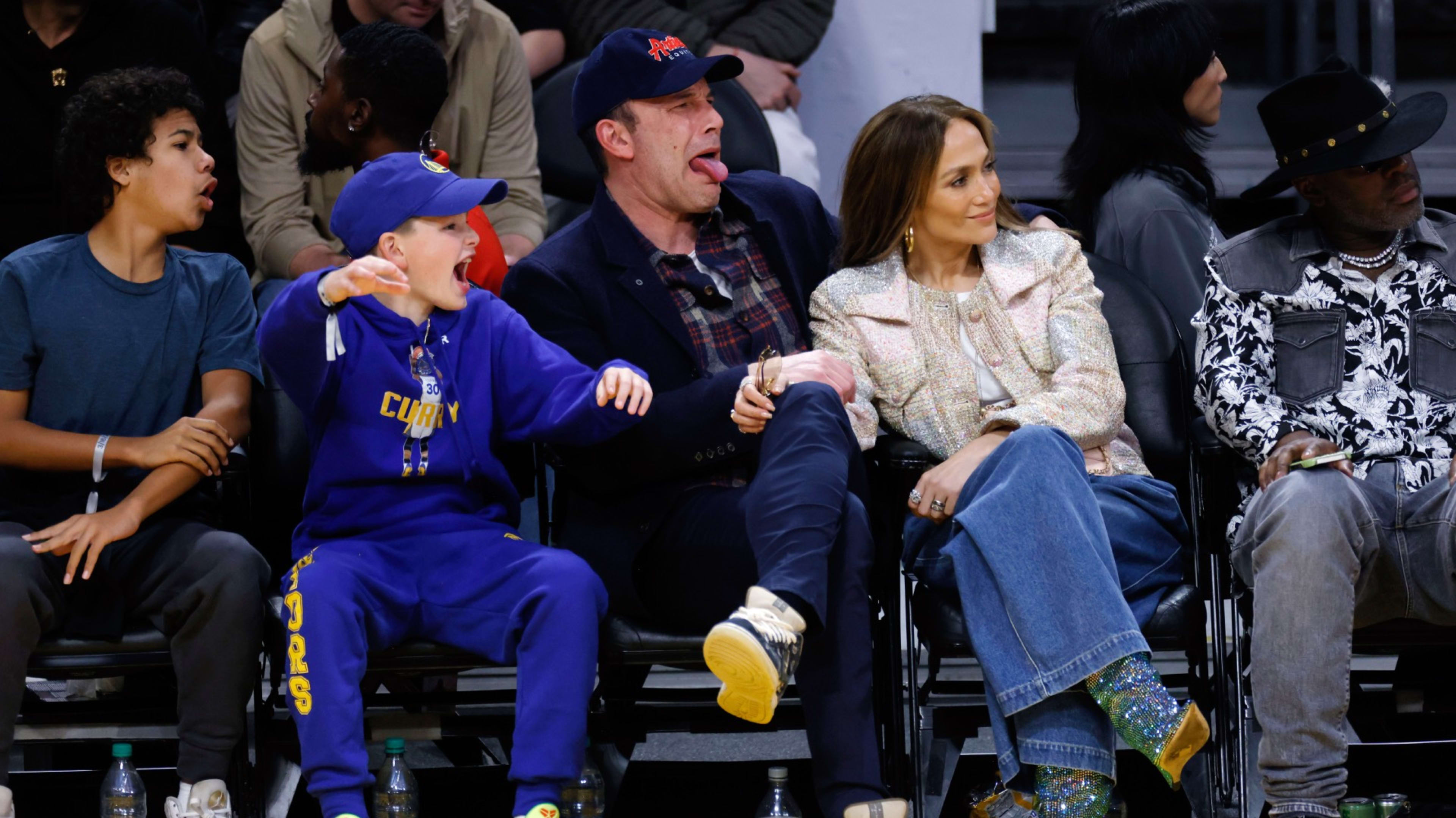 Jennifer Lopez, Ben Affleck, and his son Samuel Garner Affleck attend a 2024 basketball game between the Los Angeles Lakers and Golden State Warriors.