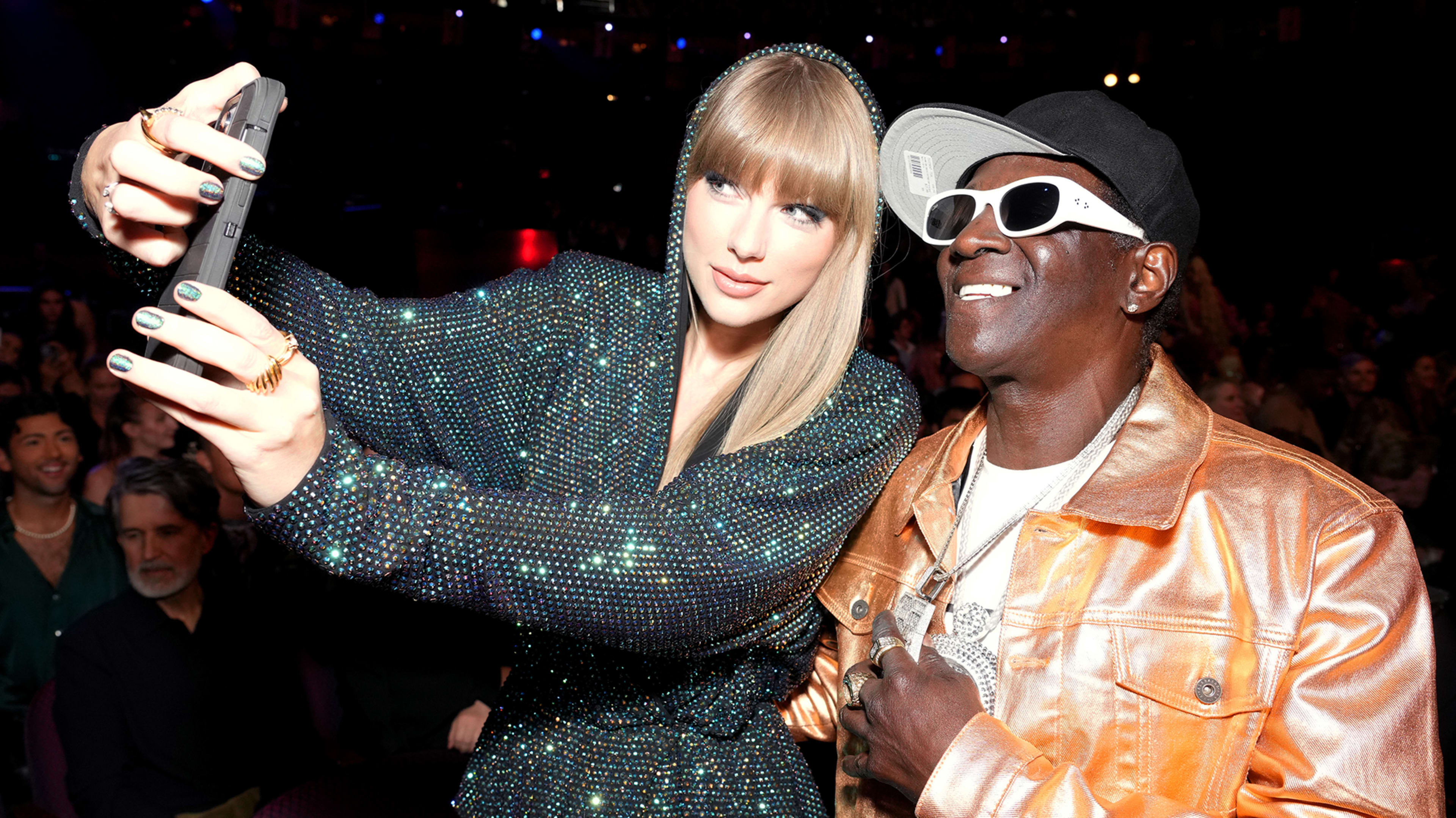 Taylor Swift and Flavor Flav at the 2023 iHeartRadio Music Awards.