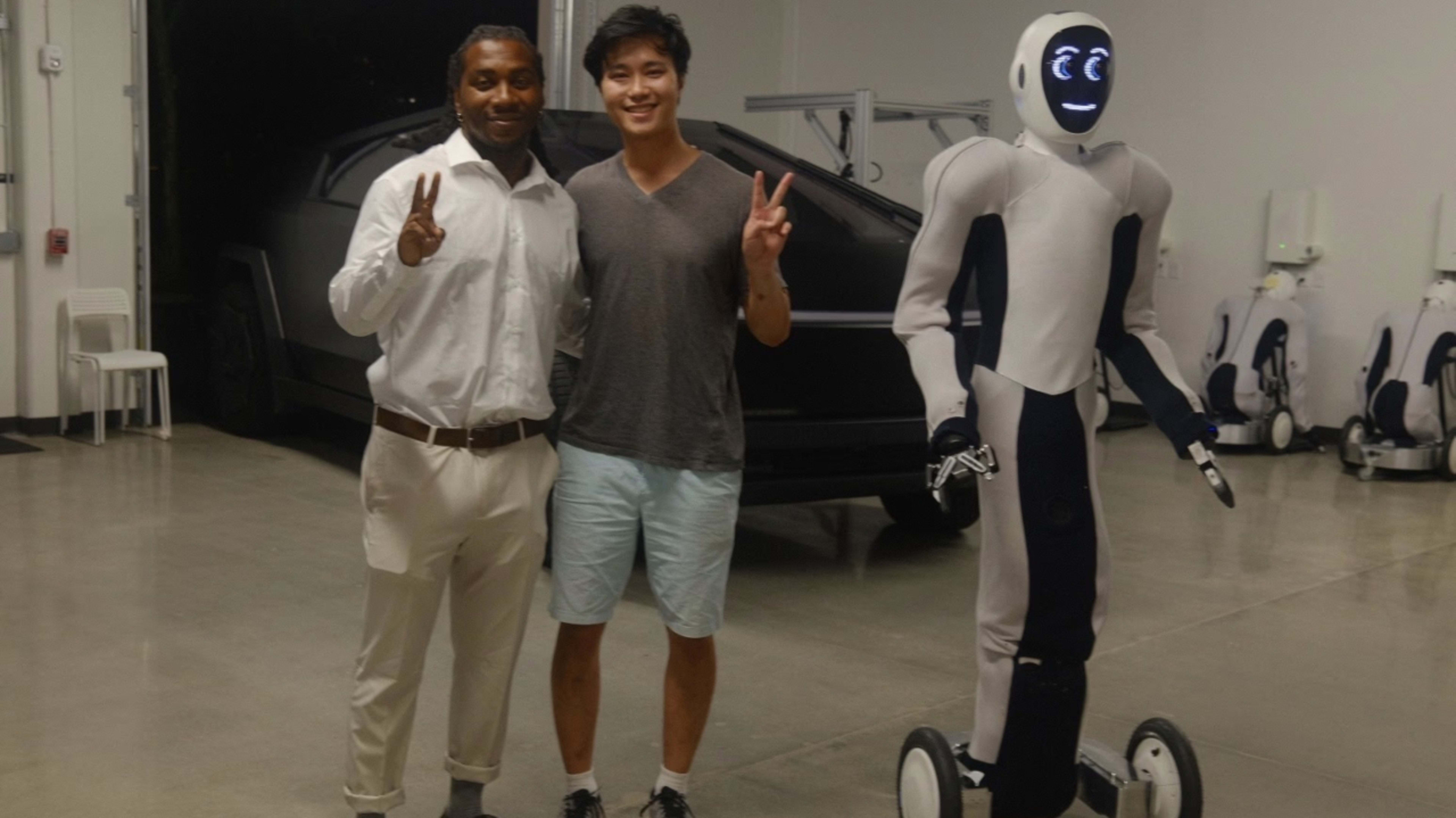 Lil B with a robot