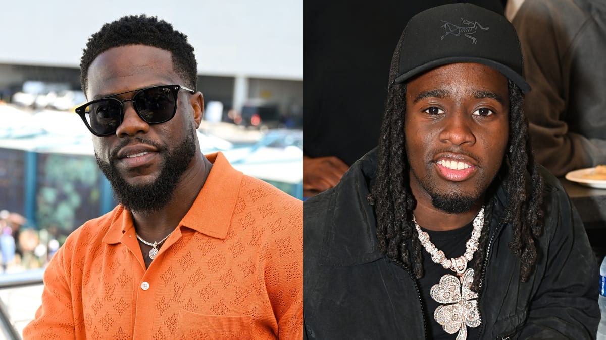 Kevin Hart in an orange shirt and sunglasses beside Twitch streamer Kai Cenat in a black jacket and baseball cap with a diamond necklace