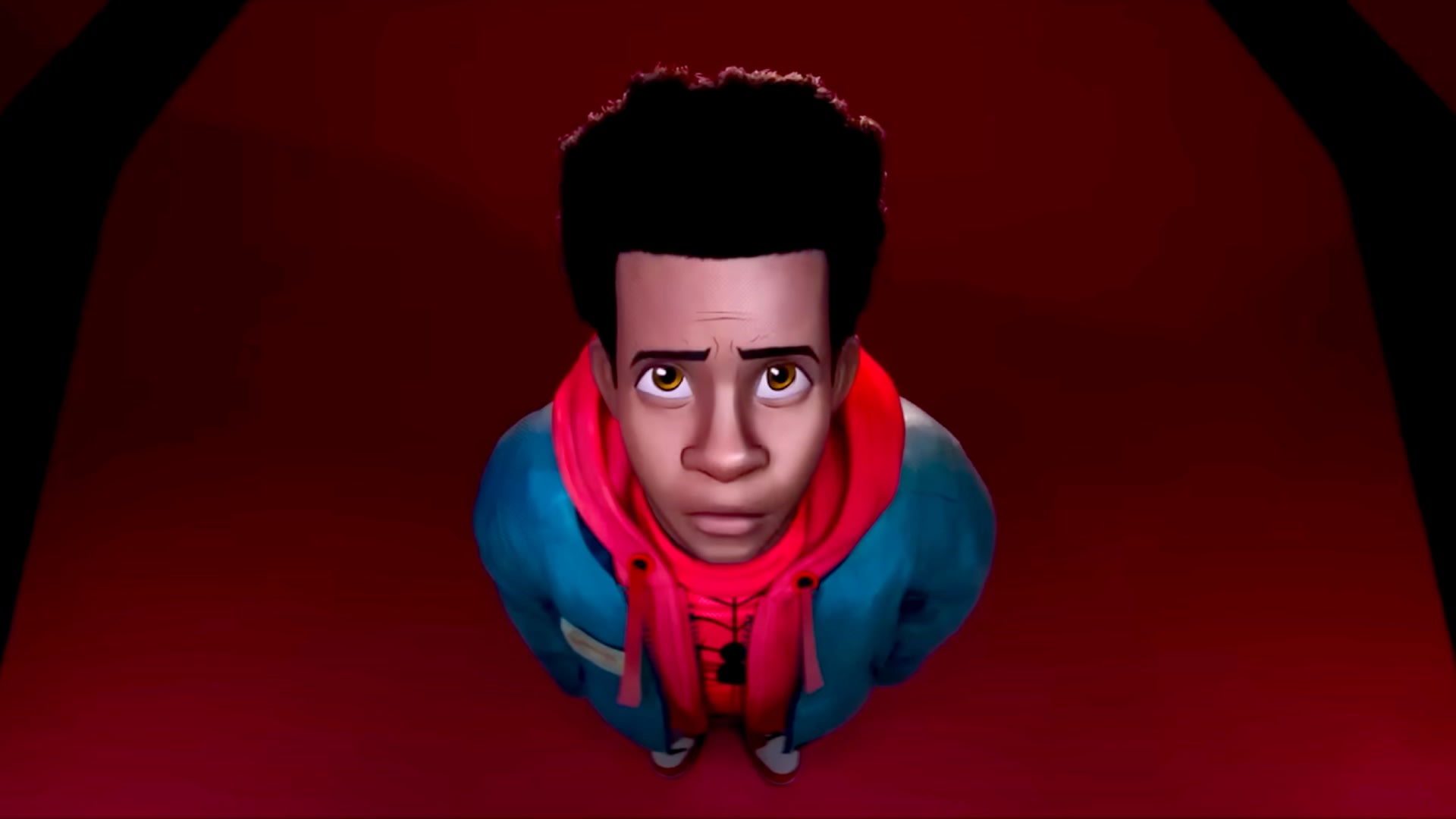 Miles Morales stares up at the camera.