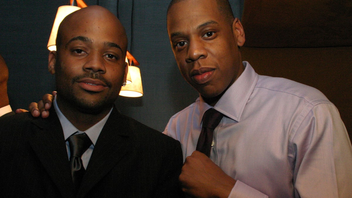 Damon Dash and Jay-Z in formal attire at an event