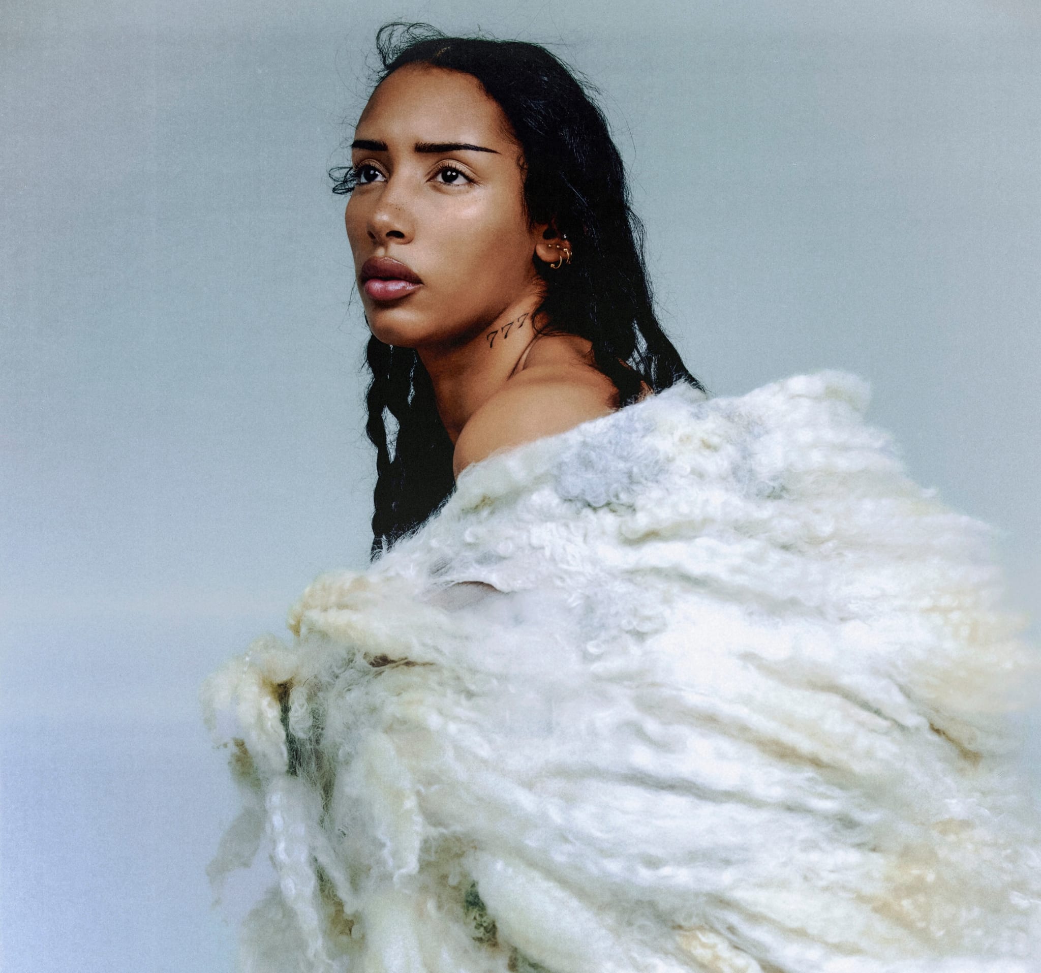 OVO artist Naomi Sharon wearing a white puffy dress