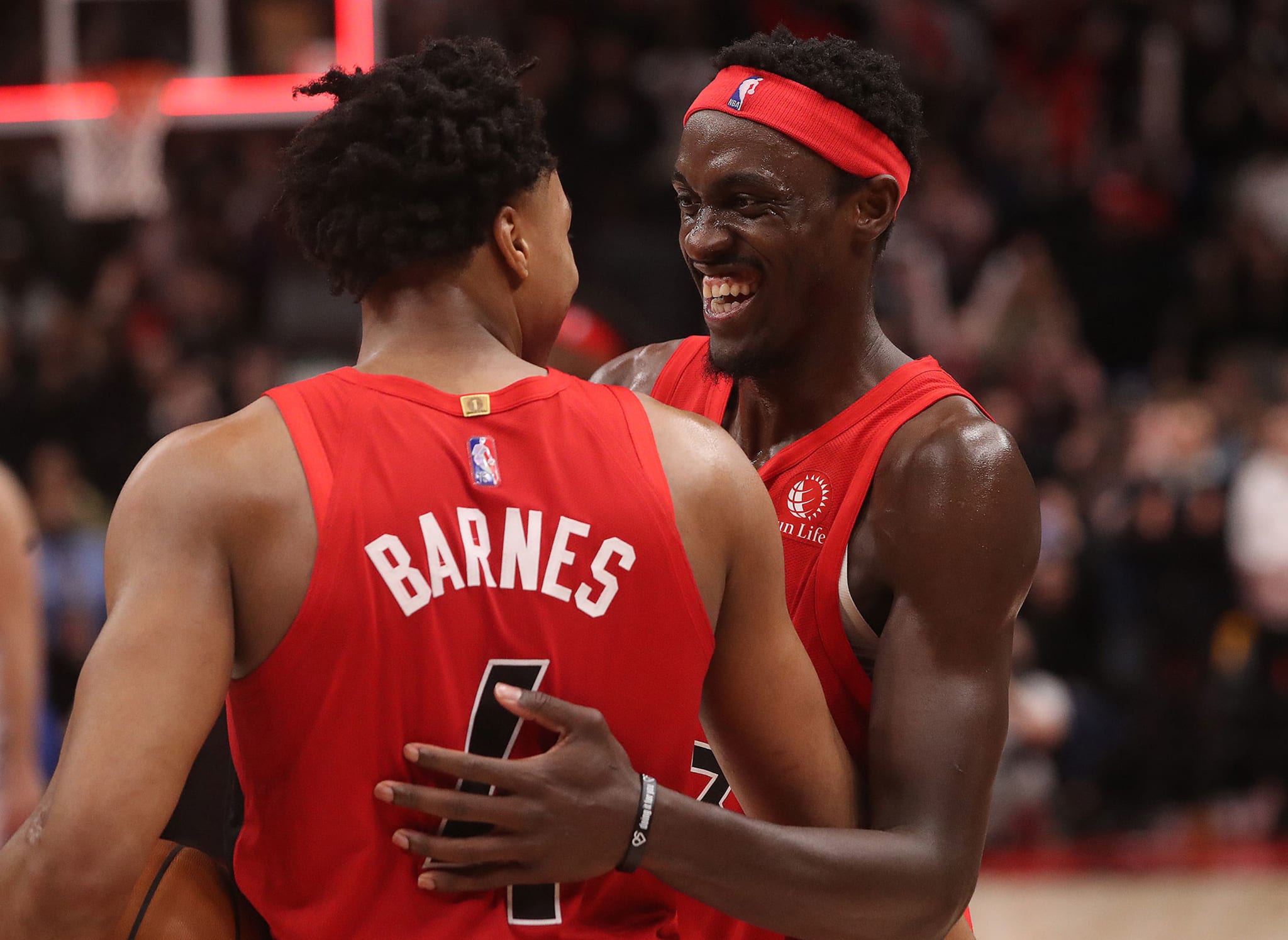 Toronto Raptors forward Scottie Barnes (4) and Toronto Raptors forward Pascal Siakam (43) celebrate