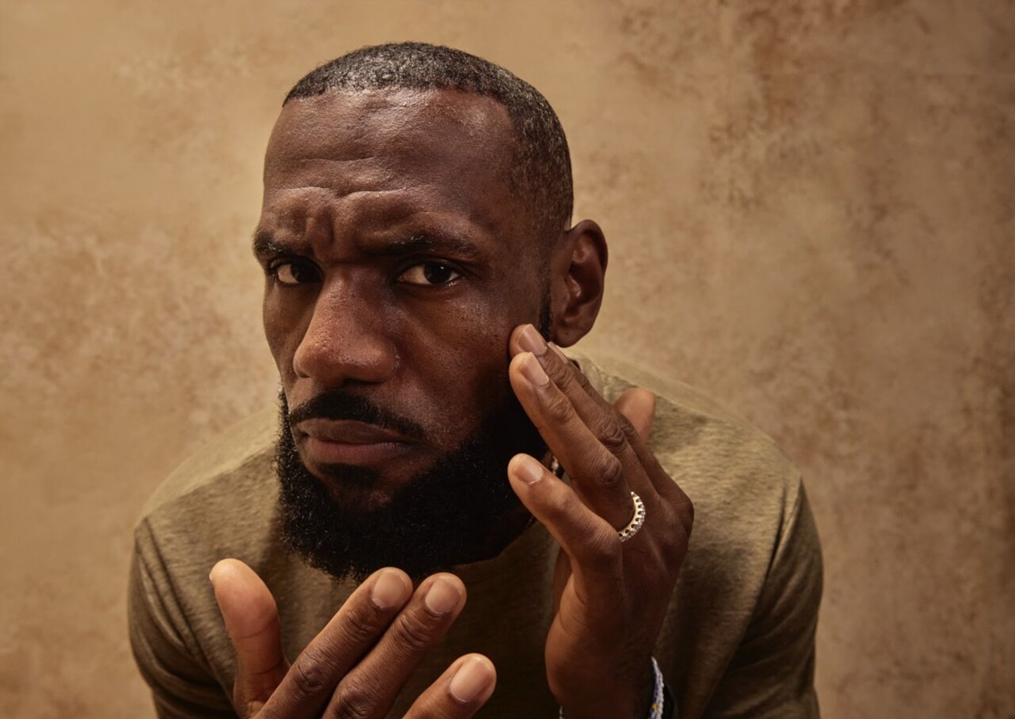 LeBron James using his The Shop grooming products.
