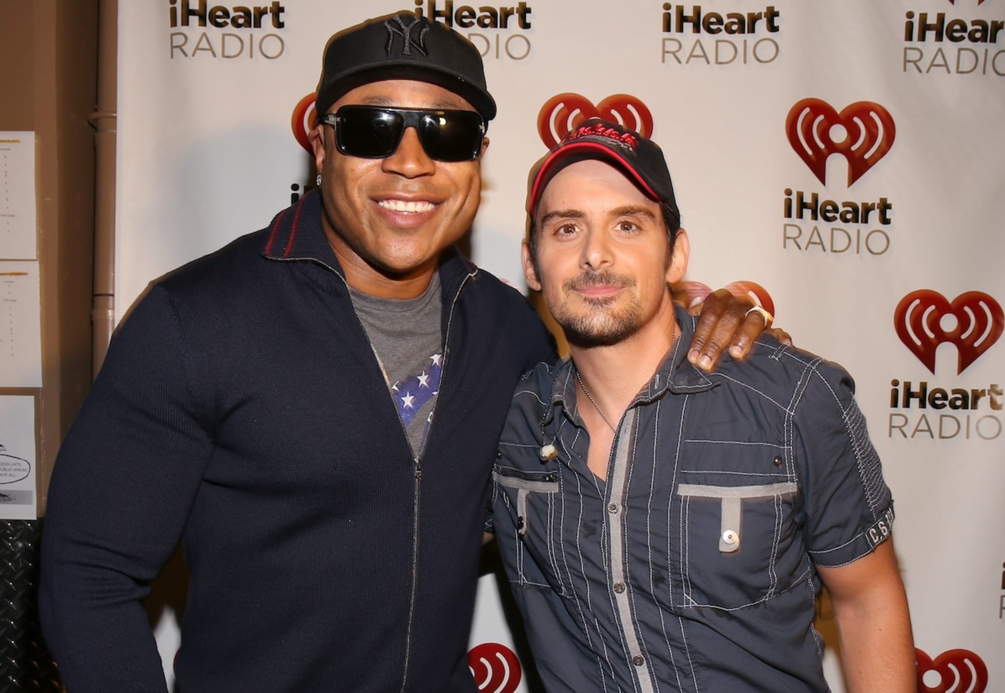 LAS VEGAS, NV - SEPTEMBER 22: Actor/rapper LL Cool J (L) and recording artist Brad Paisley appear backstage during the 2012 iHeartRadio Music Festival at the MGM Grand Garden Arena on September 22, 2012 in Las Vegas, Nevada.