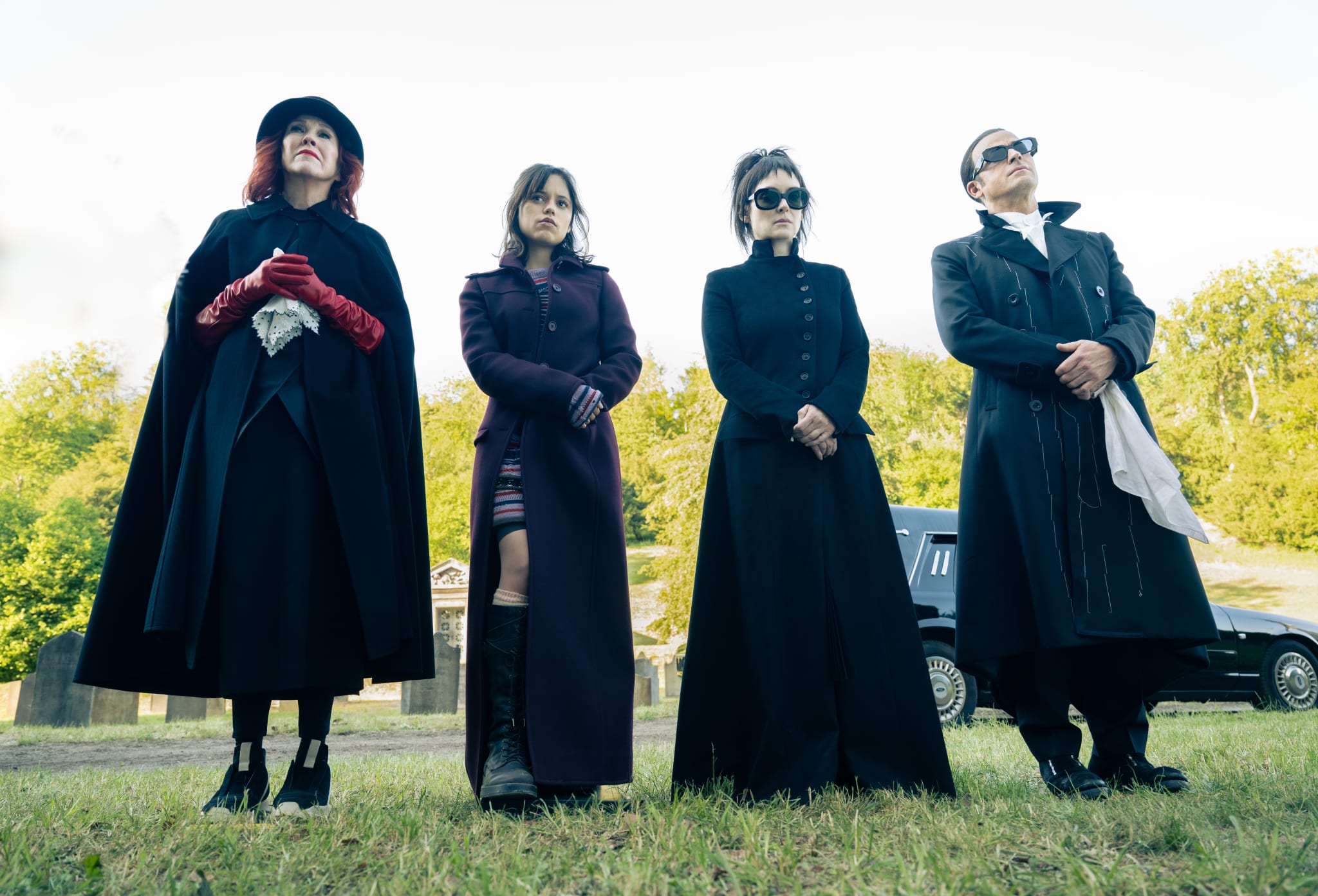 Catherine O'Hara (left), Jenna Ortega (center left), Winona Ryder (center right), Justin Theroux (right)( all stand together in Beetlejuice Beetlejuice