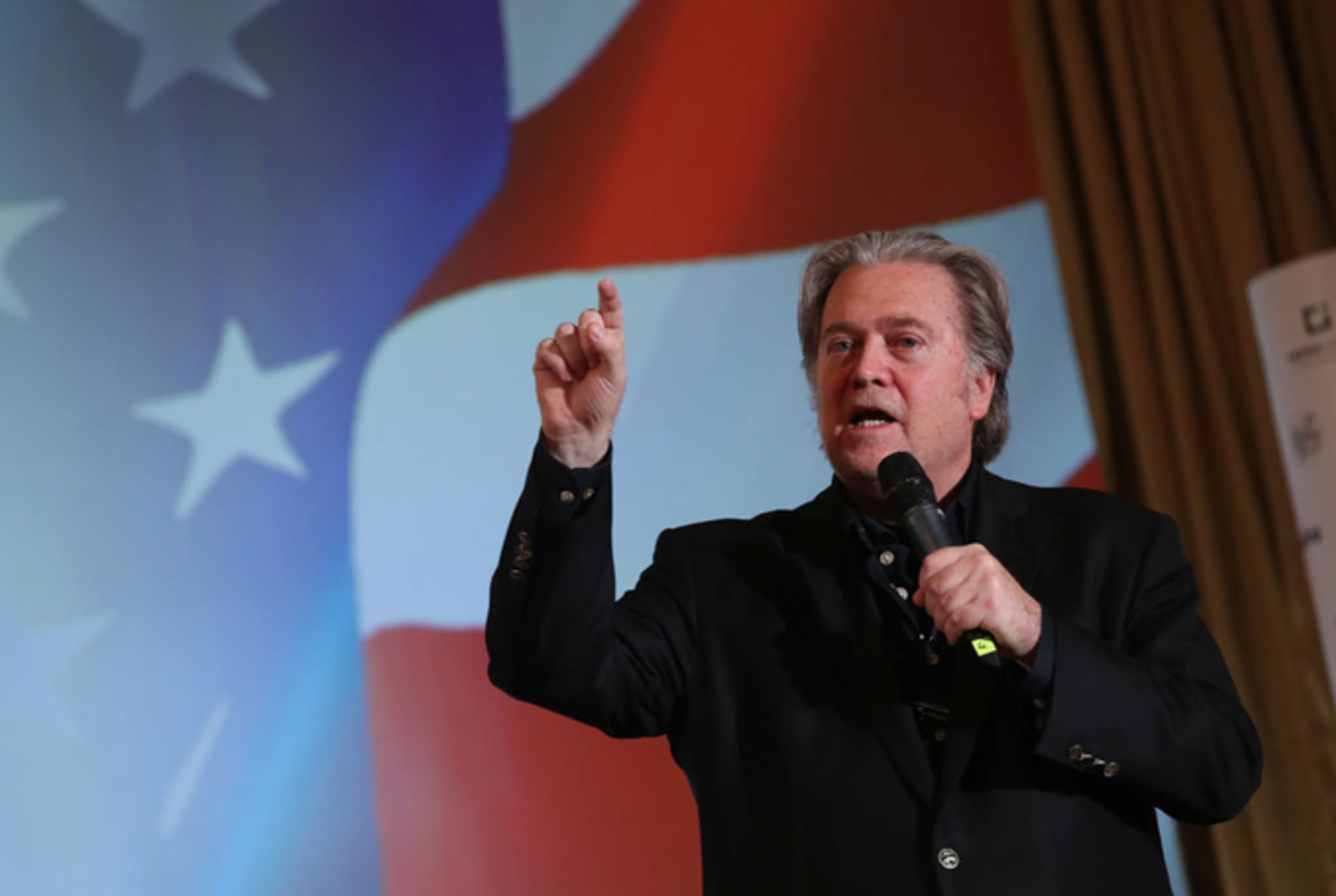 Steve Bannon speaks at a debate with Lanny Davis