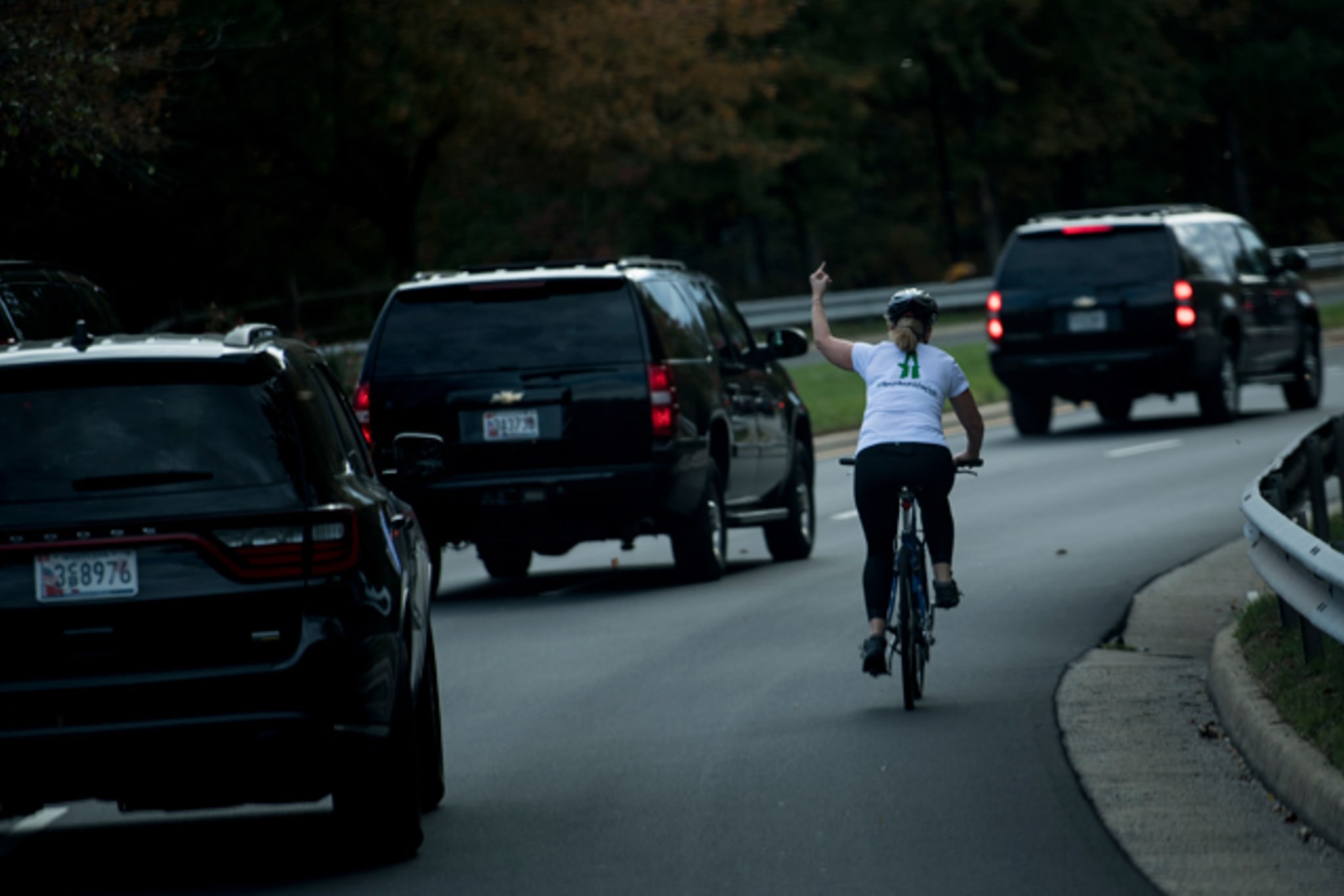 Woman gives Trump the finger