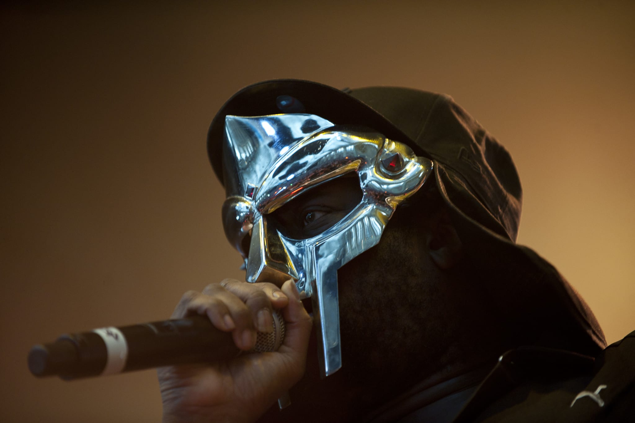 MF Doom holding a mic