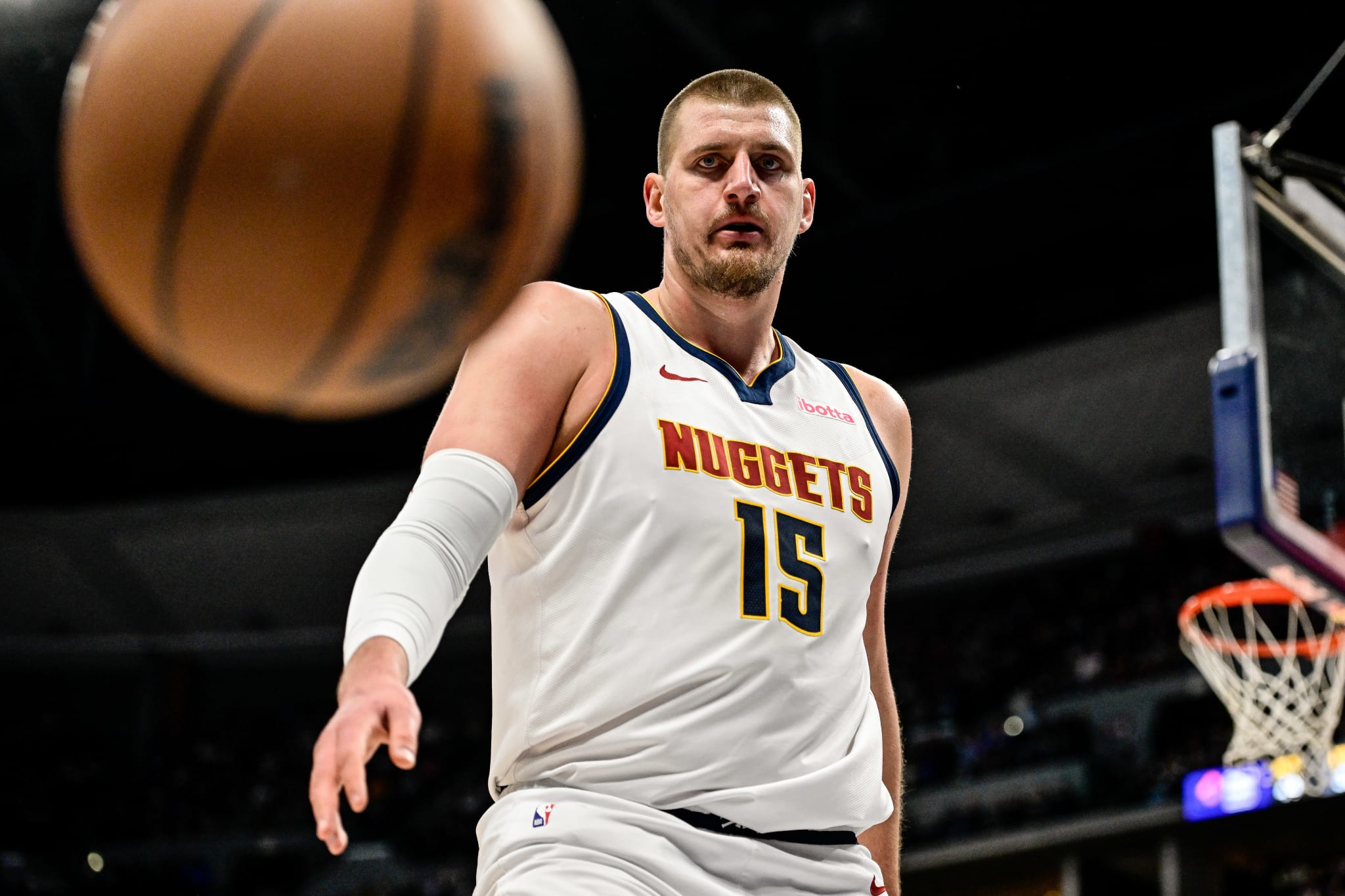 DENVER, COLORADO - MARCH 15: Nikola Jokic #15 of the Denver Nuggets watches a loose ball go out of bounds in the first half against the Washington Wizards at Ball Arena on March 15, 2025 in Denver, Colorado.
