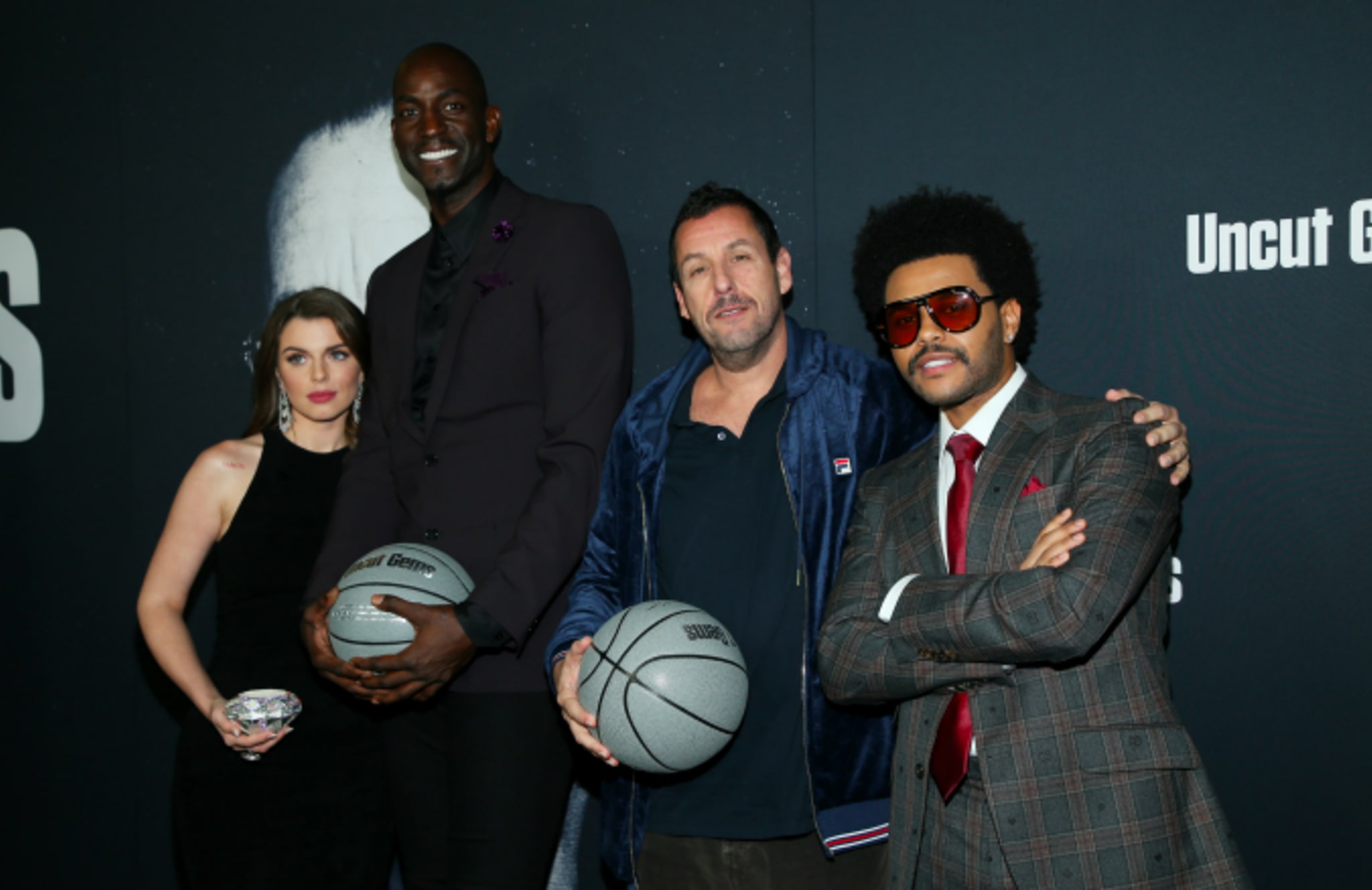 Julia Fox, Kevin Garnett, Adam Sandler and The Weeknd attend the premiere of A24's "Uncut Gems"