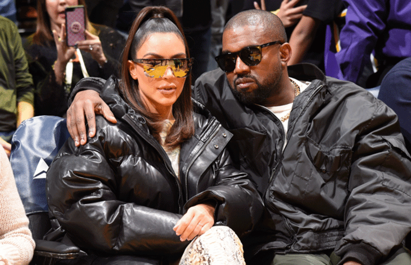 Kim Kardashian and Kanye West take in a Lakers game.