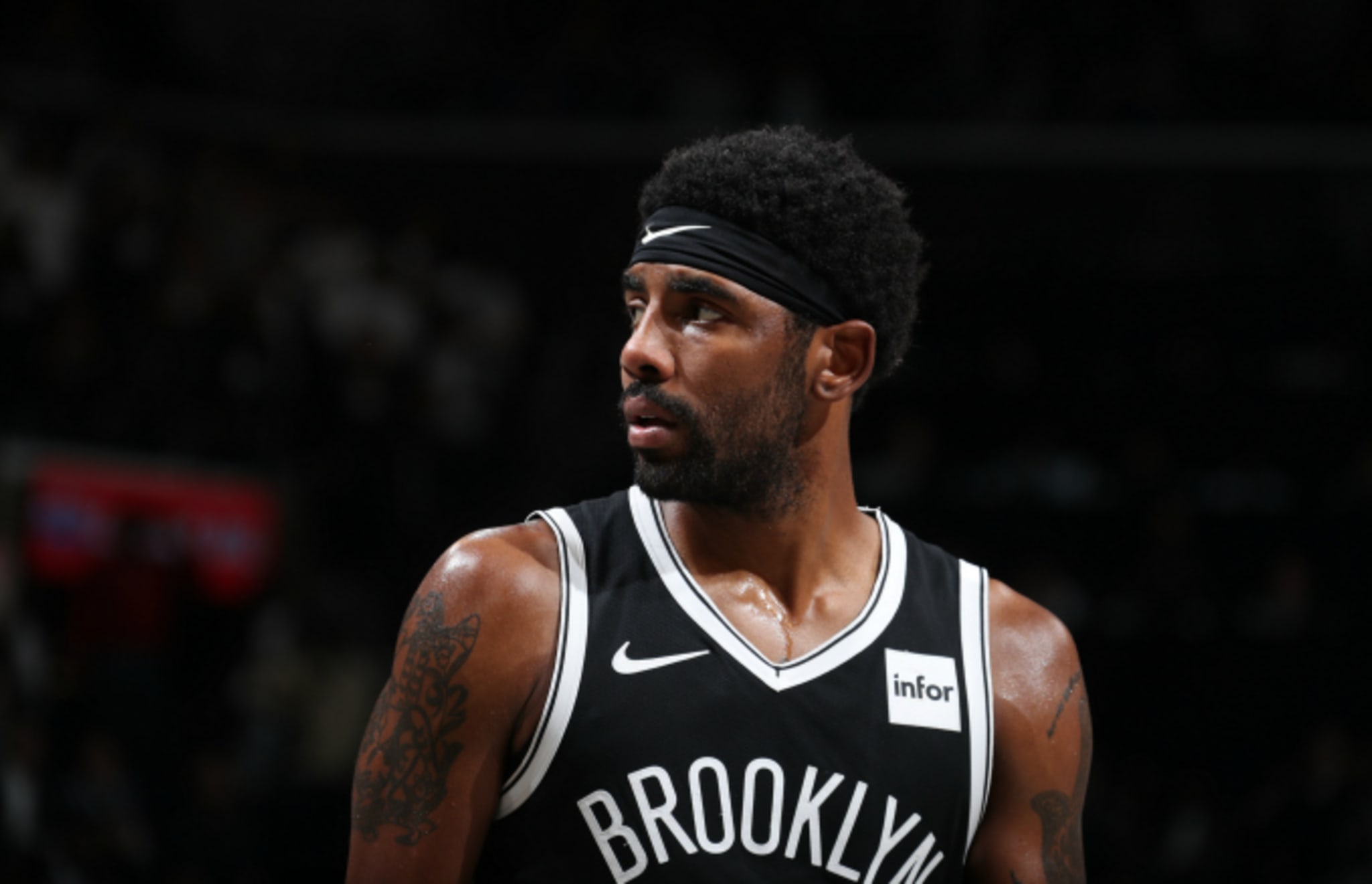 Kyrie Irving #11 of the Brooklyn Nets looks on against the New York Knicks