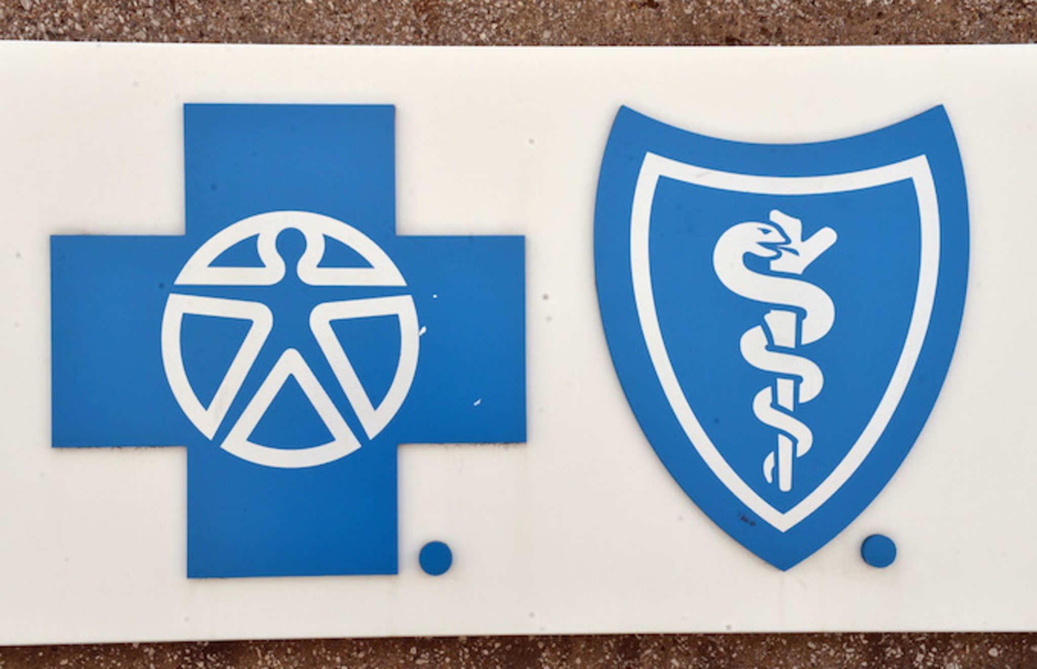 The logo of Blue Cross Blue Shield pictured in the city centre of Detroit.
