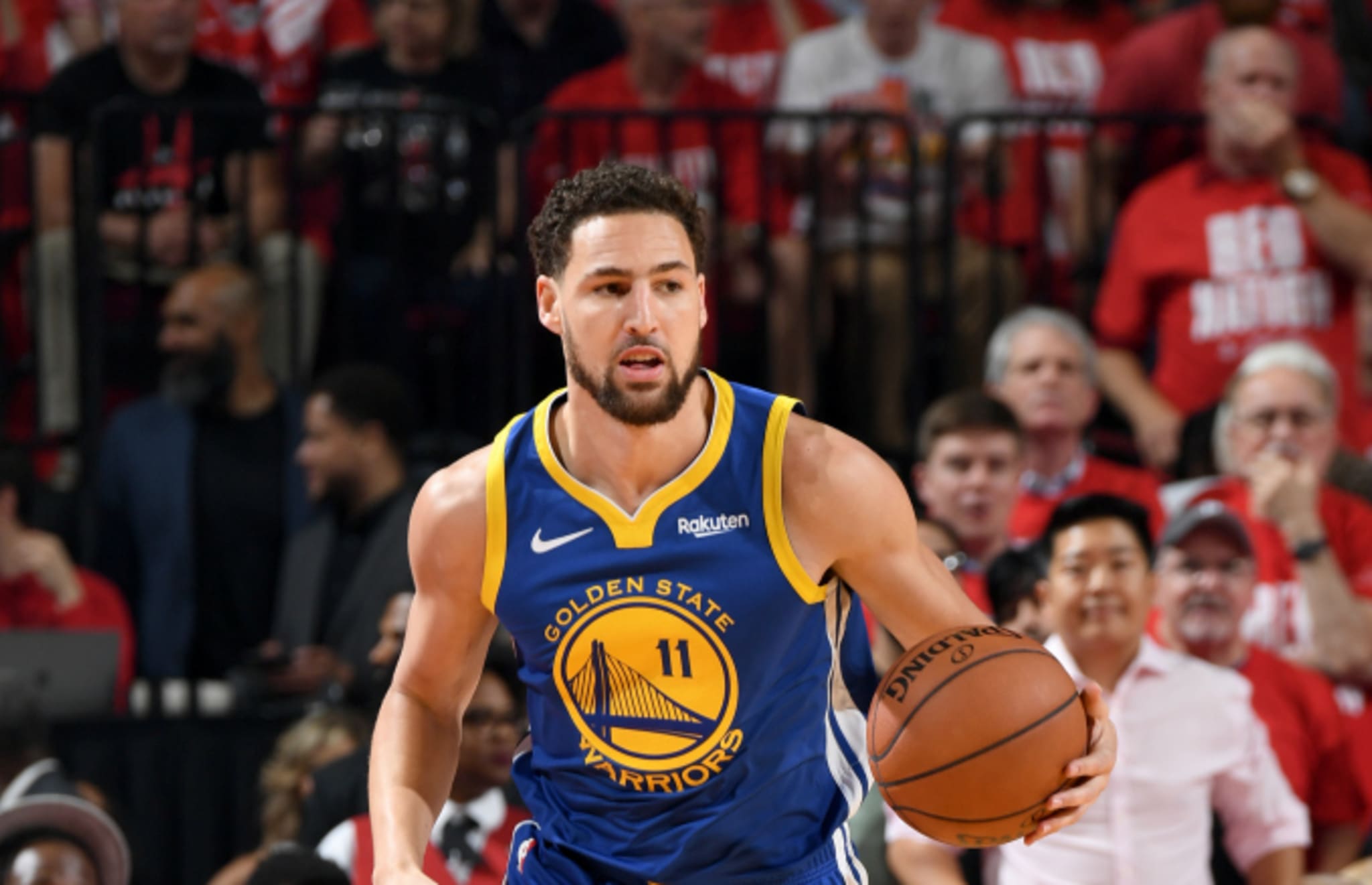 Klay Thompson #11 of the Golden State Warriors handles the ball