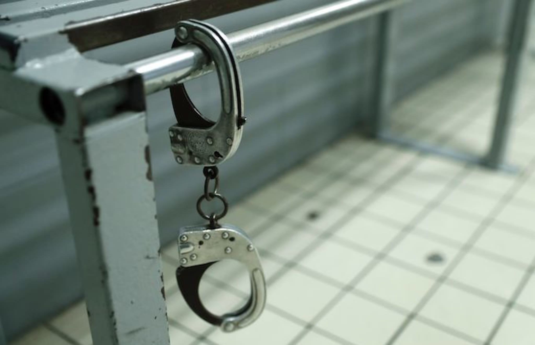 handcuffs white woman arrested after saying racial slurs