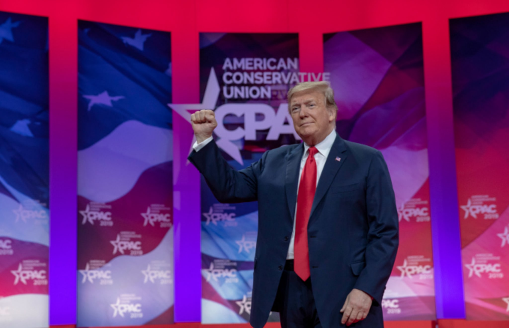 President Donald Trump greets supporters during CPAC 2019