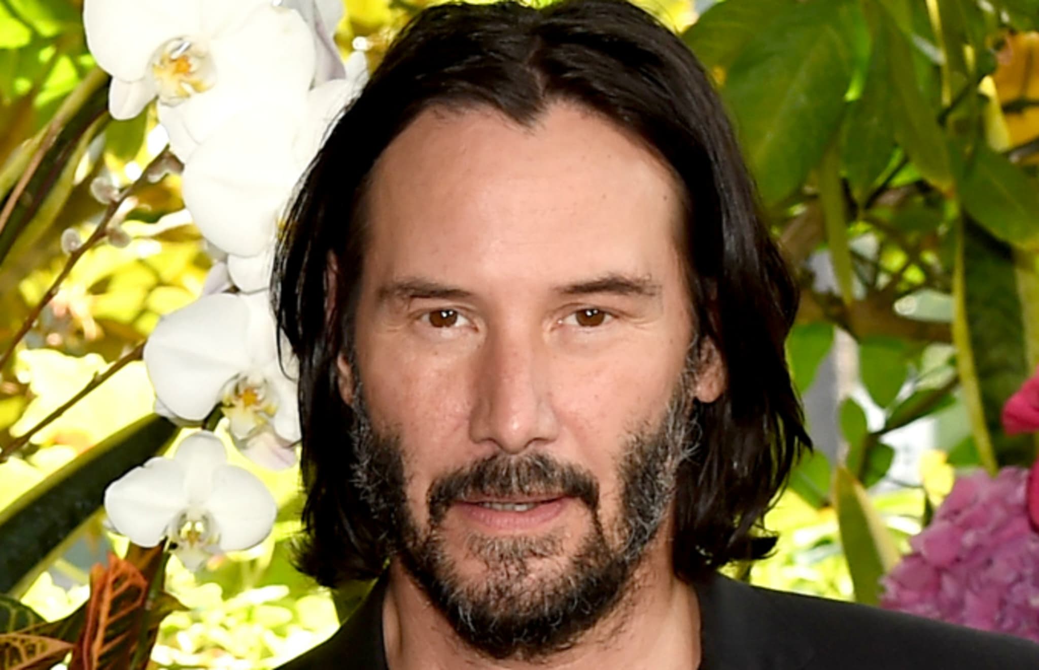 Keanu Reeves attends a photo call for Regatta's 'Destination Wedding'