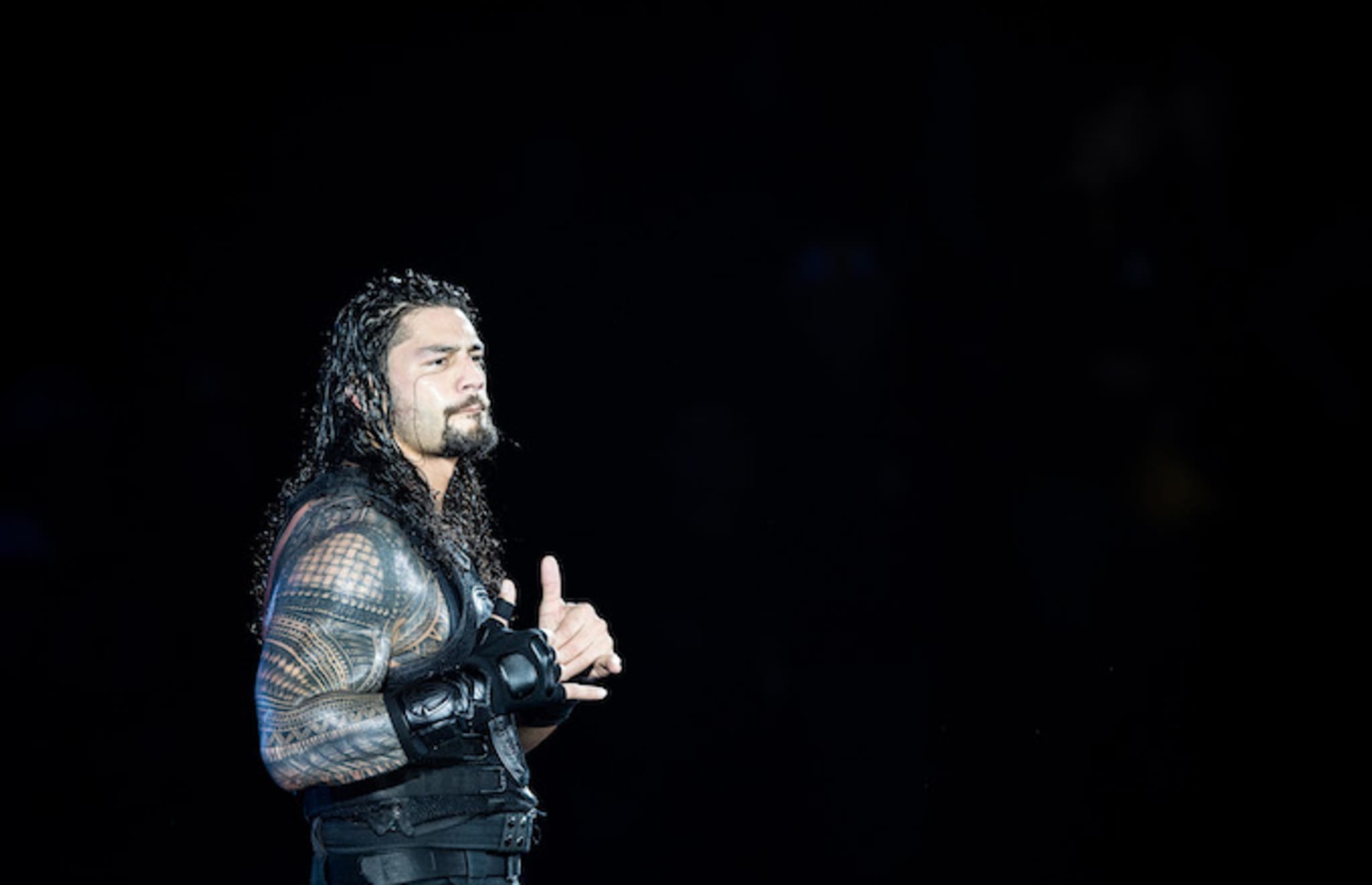 Roman Reigns reacts during to the WWE Live Duesseldorf event.