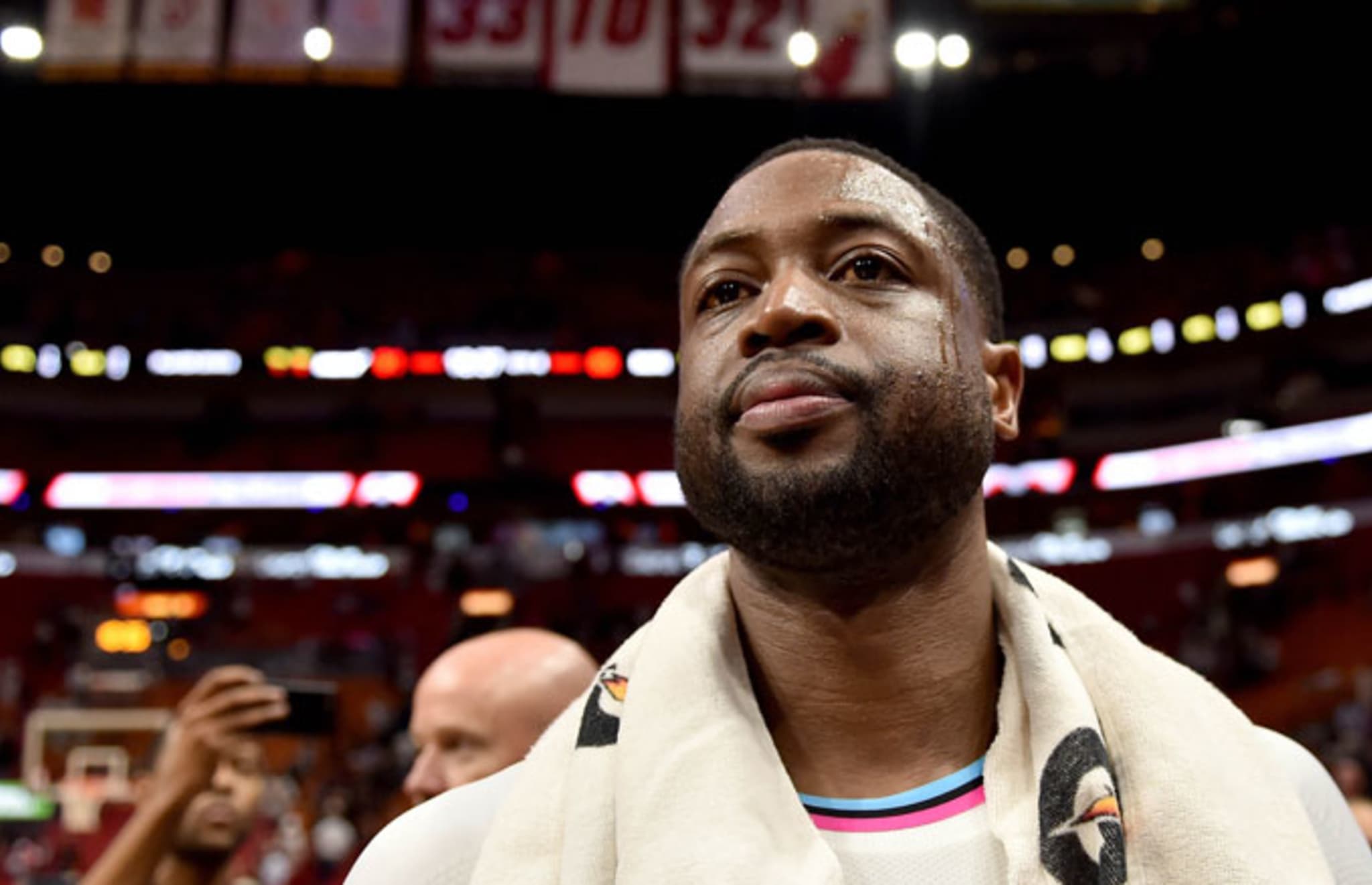 Dwyane Wade looks for family after a game against the Bucks.