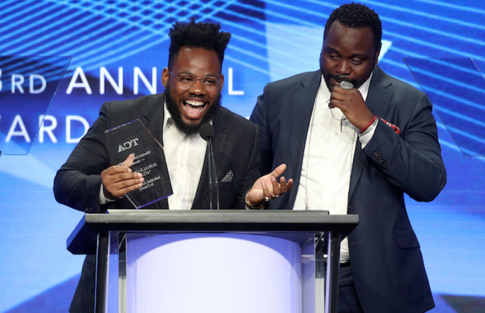 Stephen Glover and actor Brian Tyree Henry accept the award for 'Individual Achievement in Comedy.'