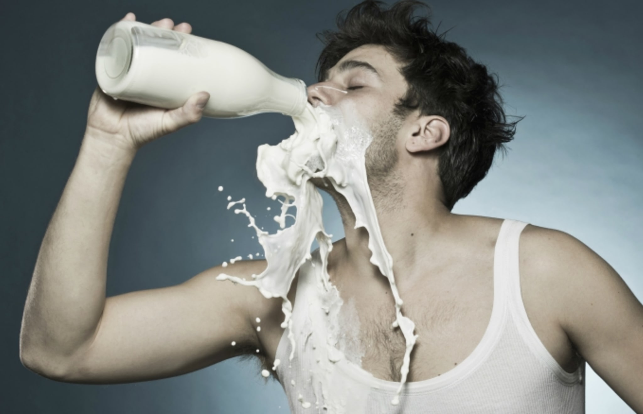 Man drinking milk.