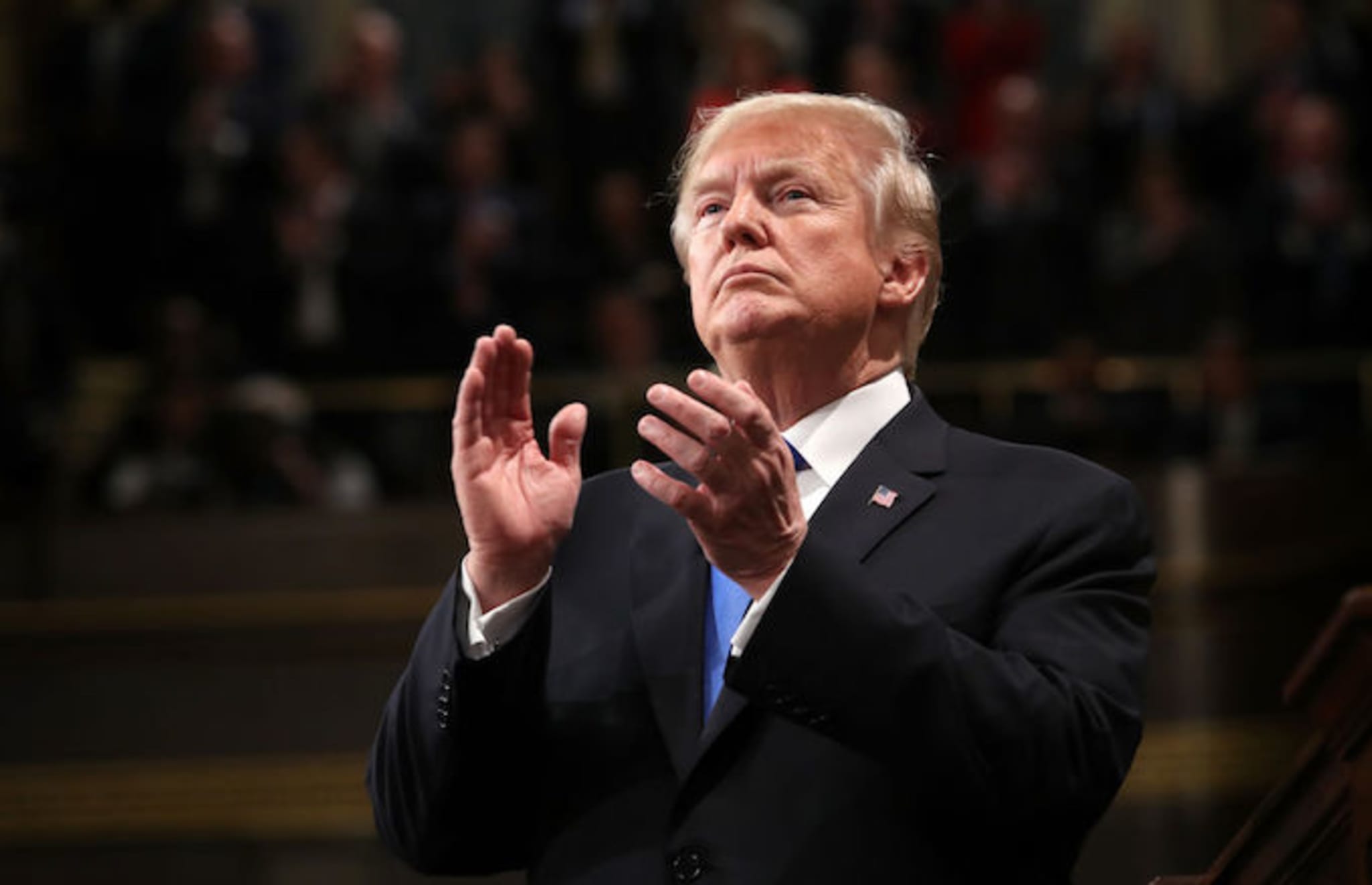 Donald Trump clapping at the 2018 State of the Union address.