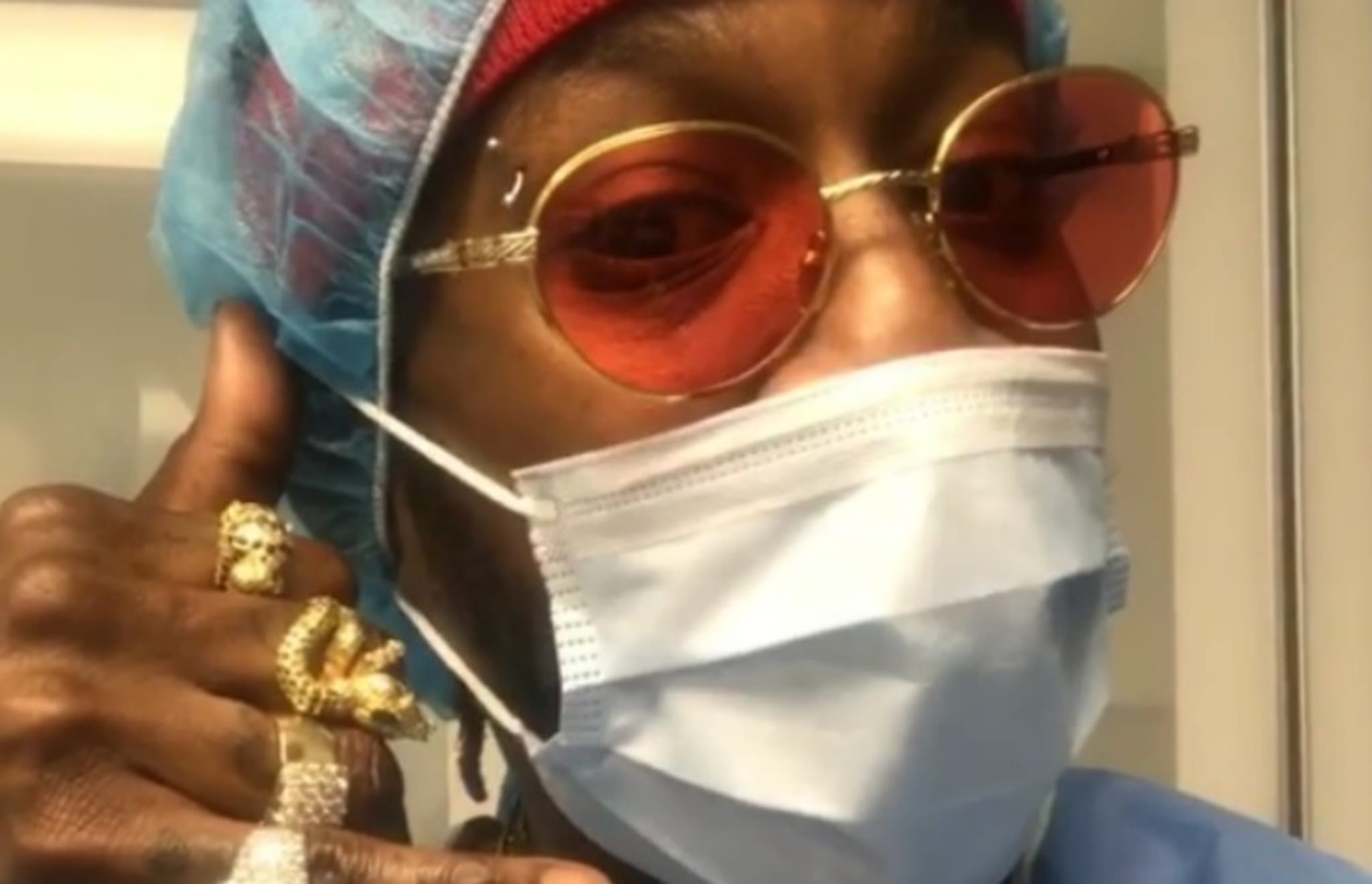 2 Chainz watches a booty enhancement surgery.