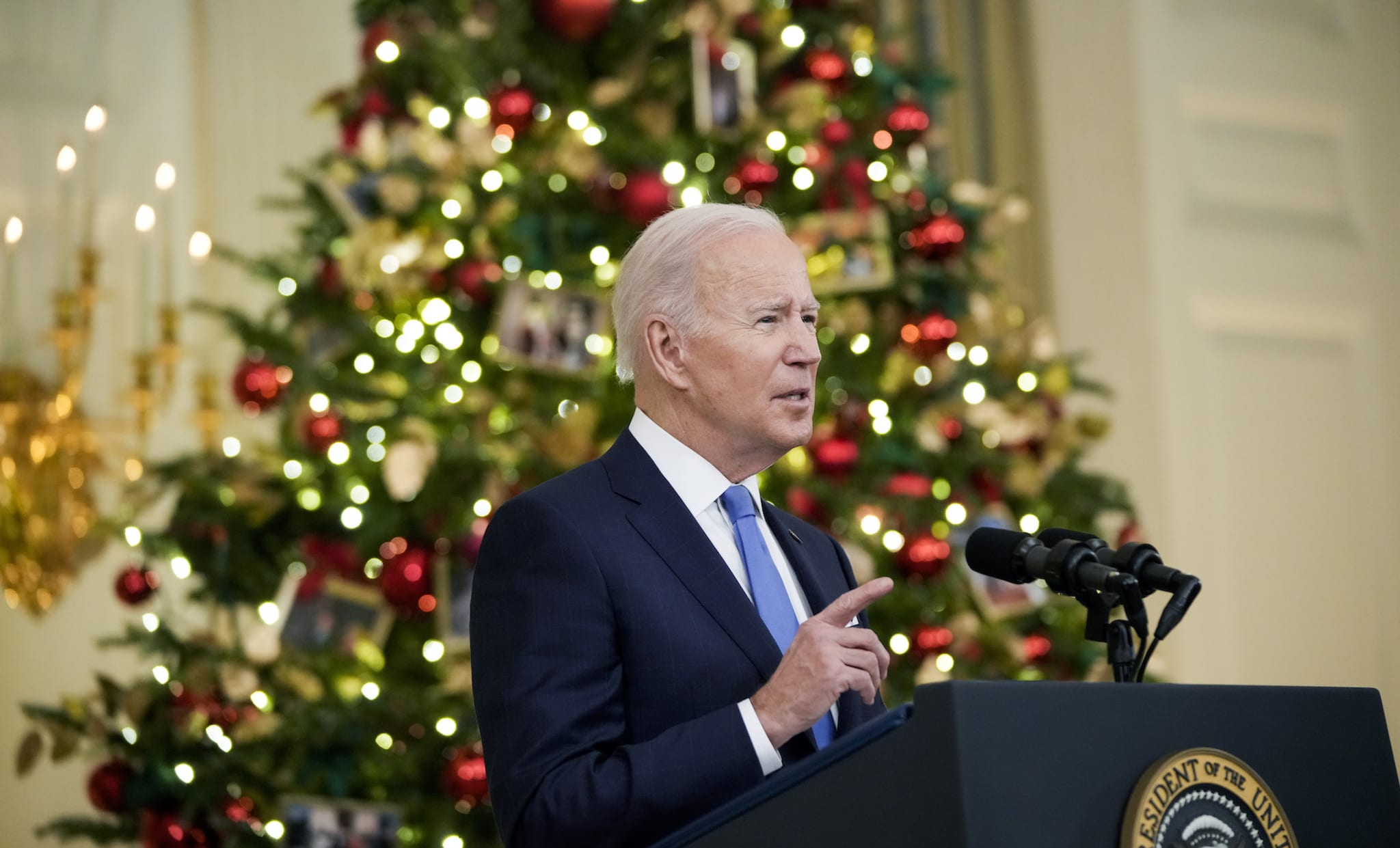 Joe Biden in front of a xmas tree