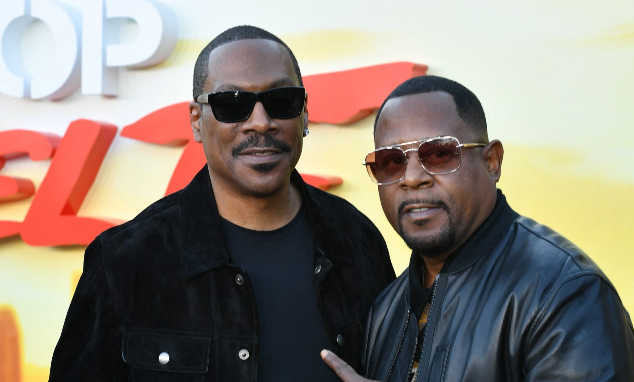 US actors Eddie Murphy and Martin Lawrence (R) attend Netflix's premiere of "Beverly Hills Cop: Axel F" at the Wallis Annenberg Center for the Performing Arts in Beverly Hills, California, June 20, 2024.