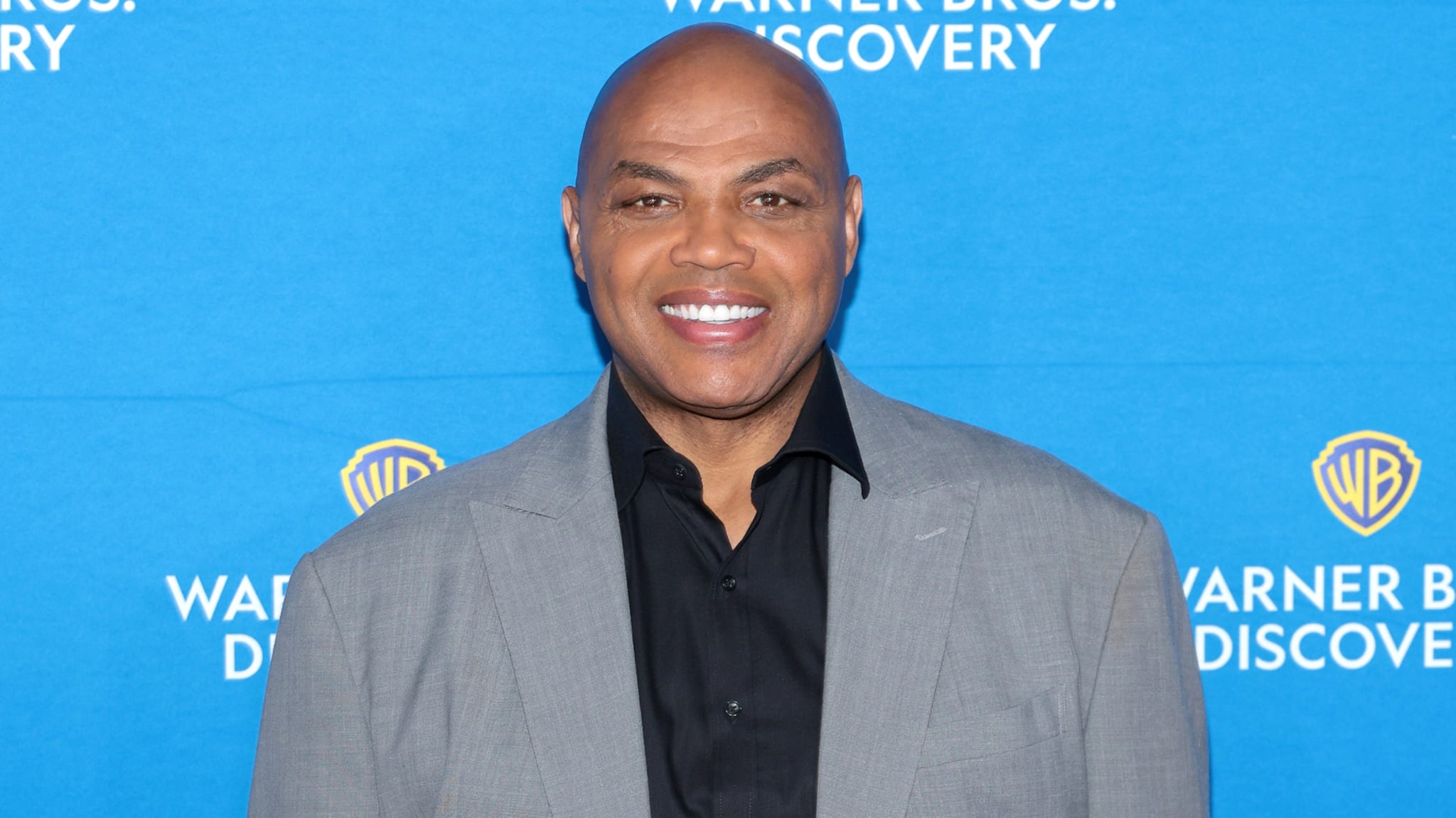 Charles Barkley posing for a picture.