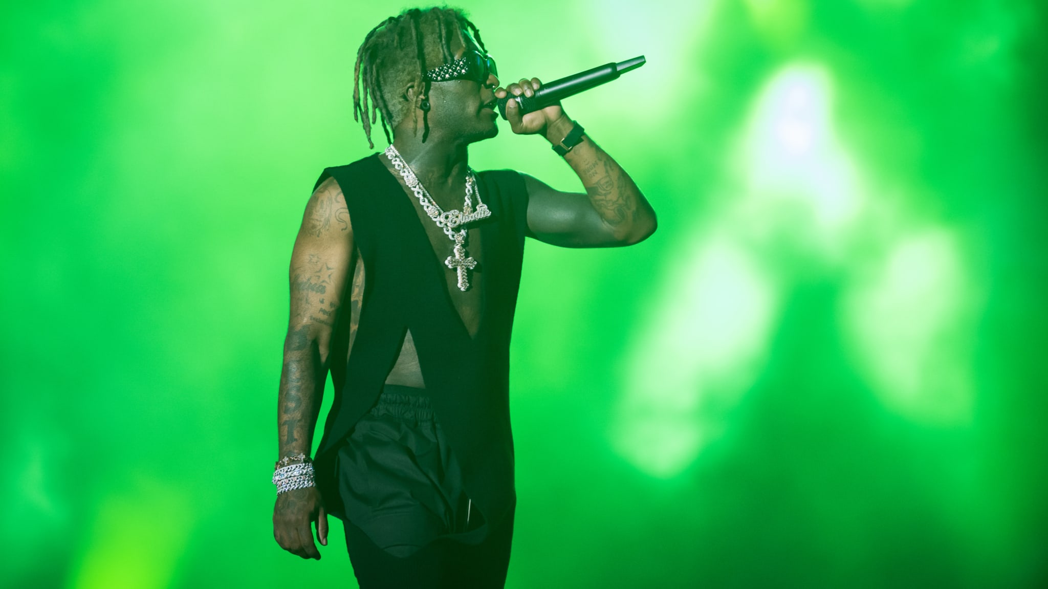 lil uzi vert holds mic while performing