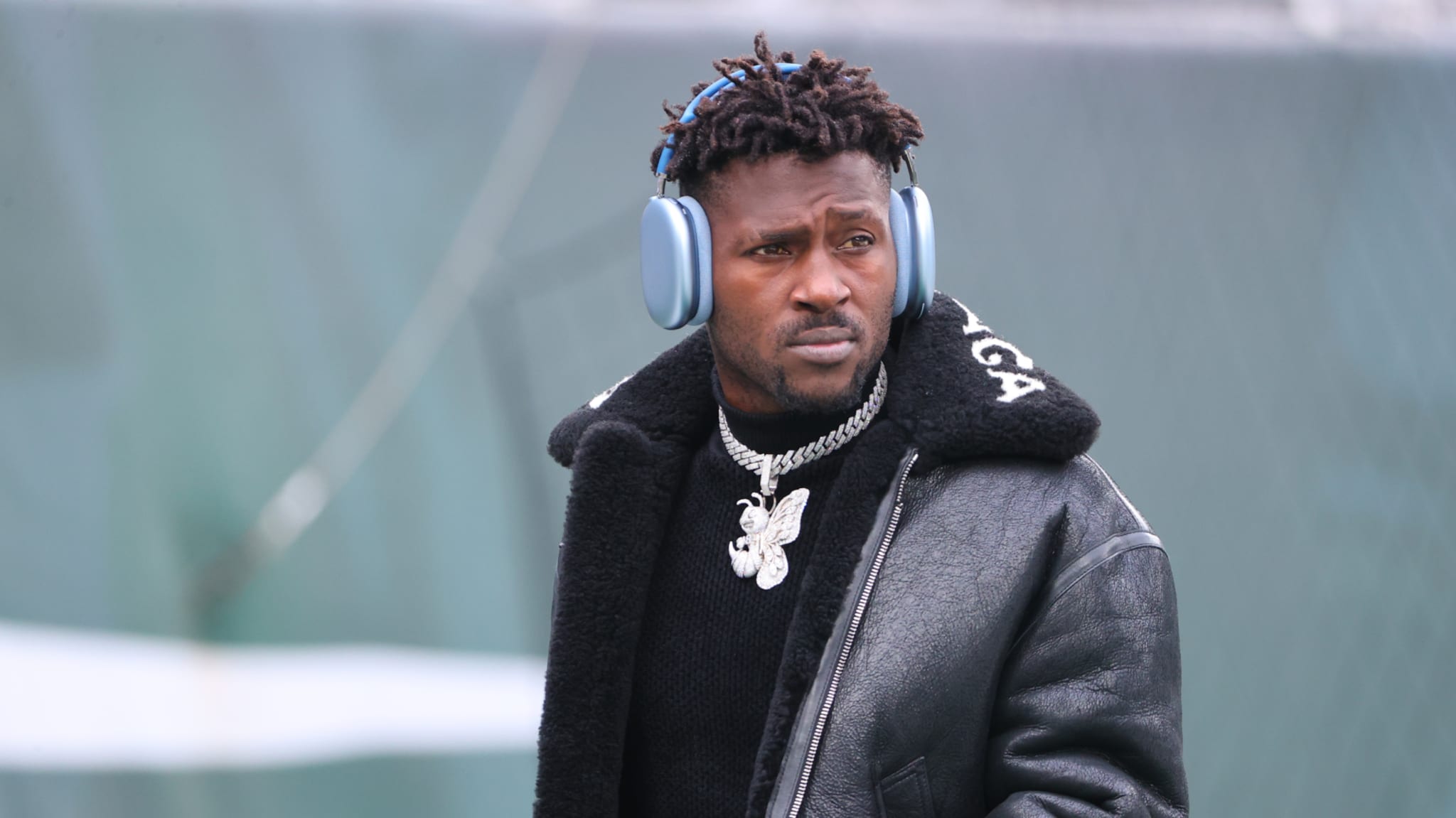 Tampa Bay Buccaneers wide receiver Antonio Brown (81) on the field in a Balenciaga jacket