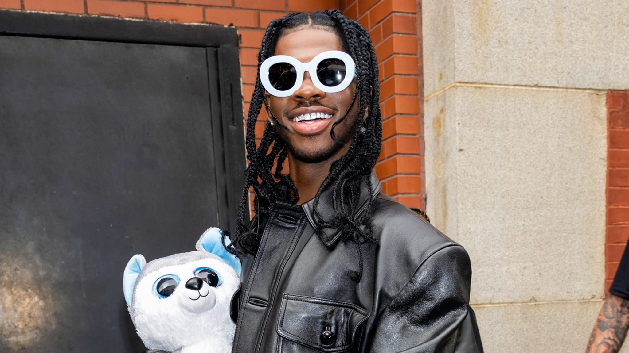 Lil Nas X is seen walking around in the city