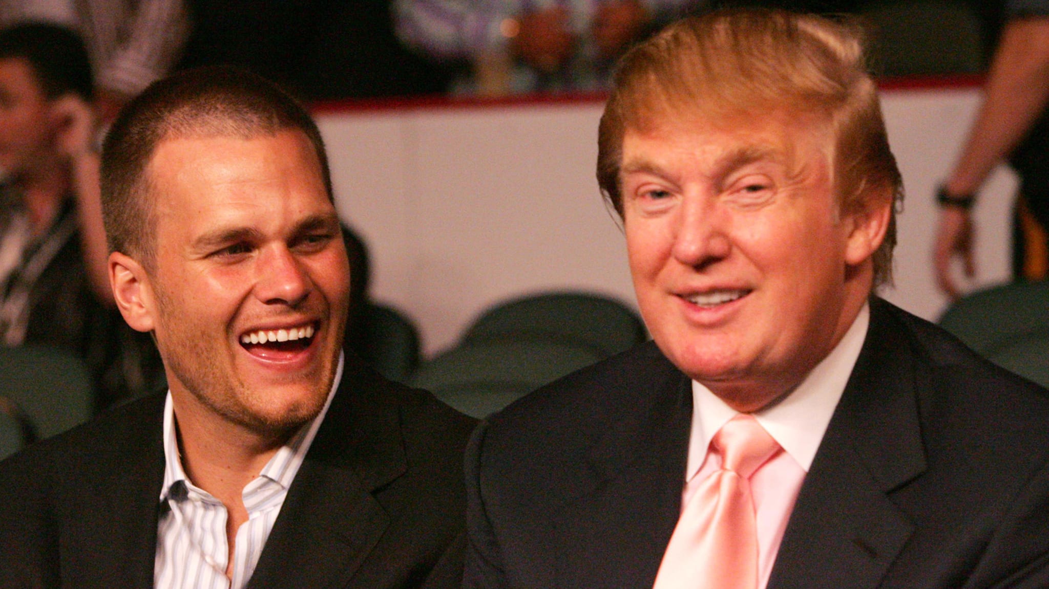 New England Patriots quarterback Tom Brady chats with Donald Trump