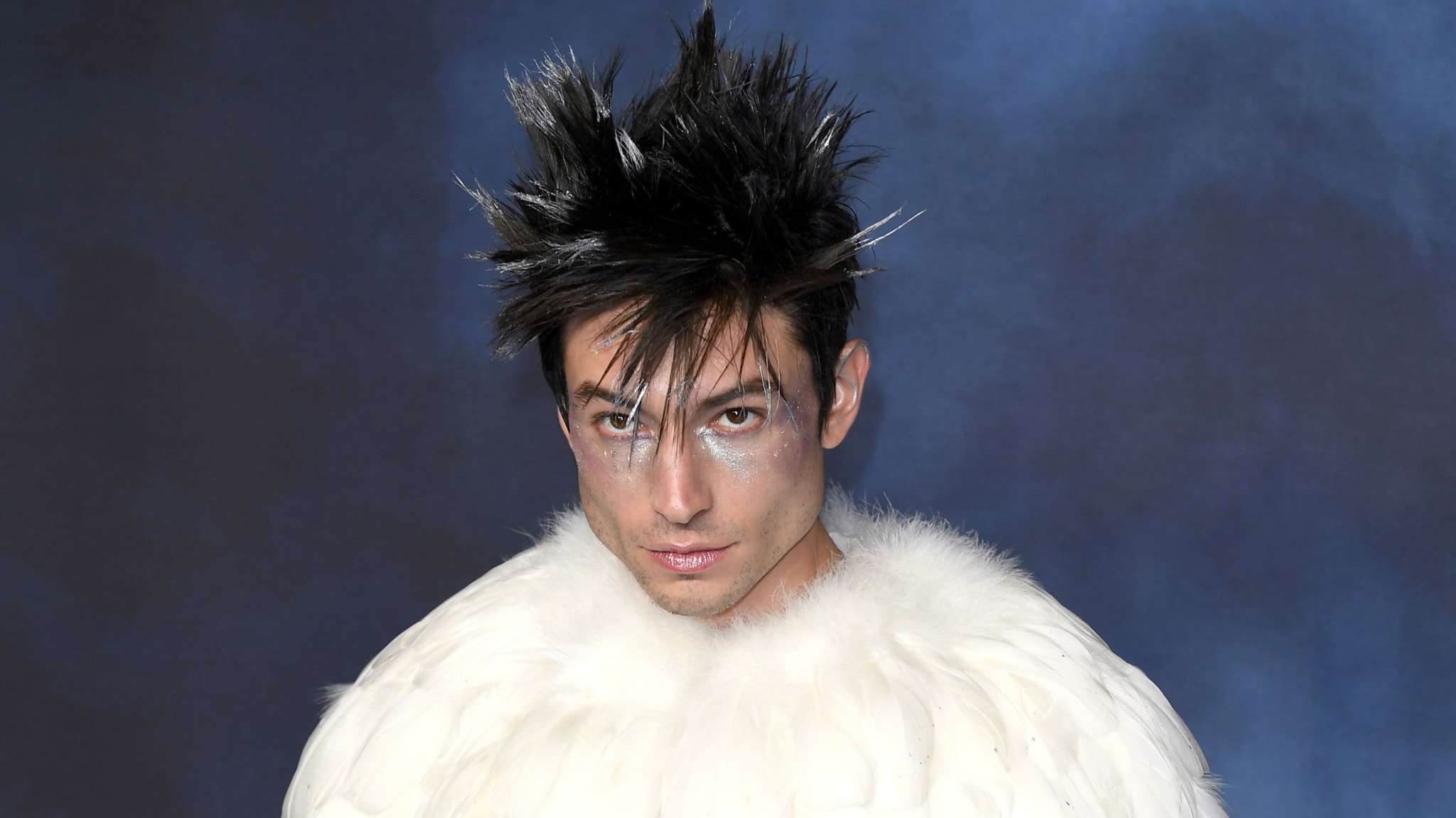 Ezra Miller is seen on a red carpet