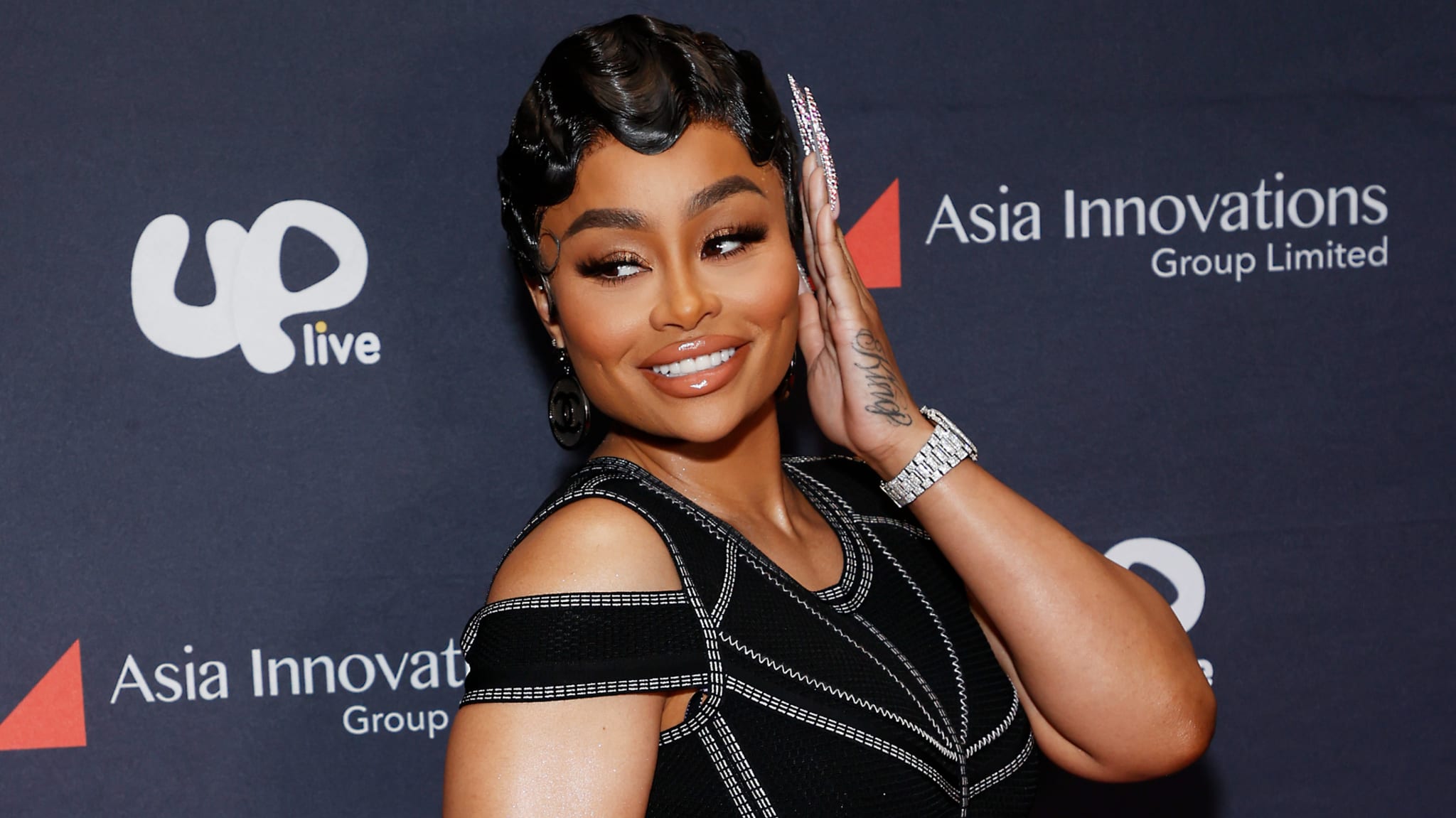 Blac Chyna is pictured at an event on the red carpet