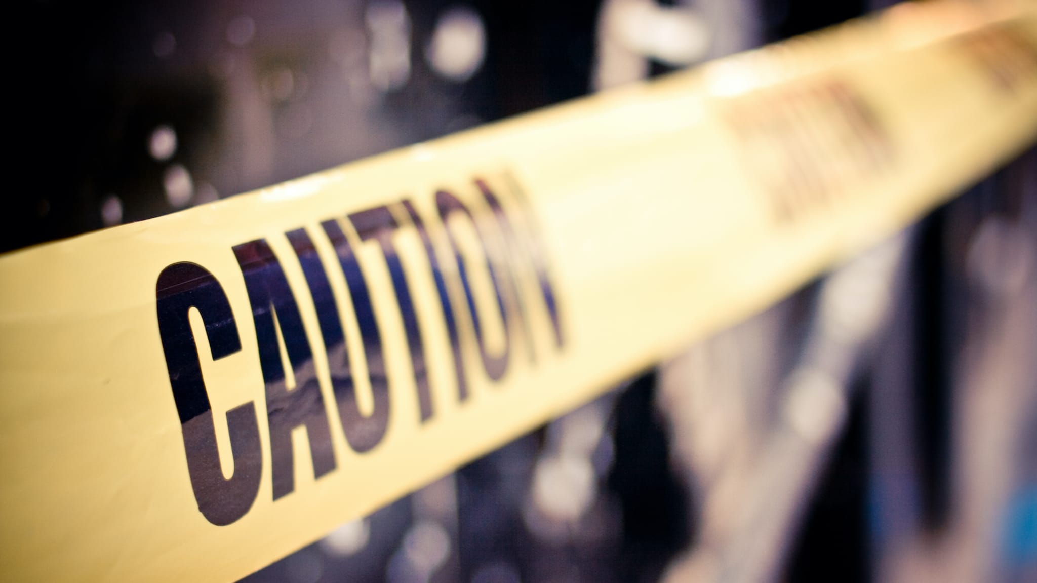This is a picture of caution tape that's being used for an article.