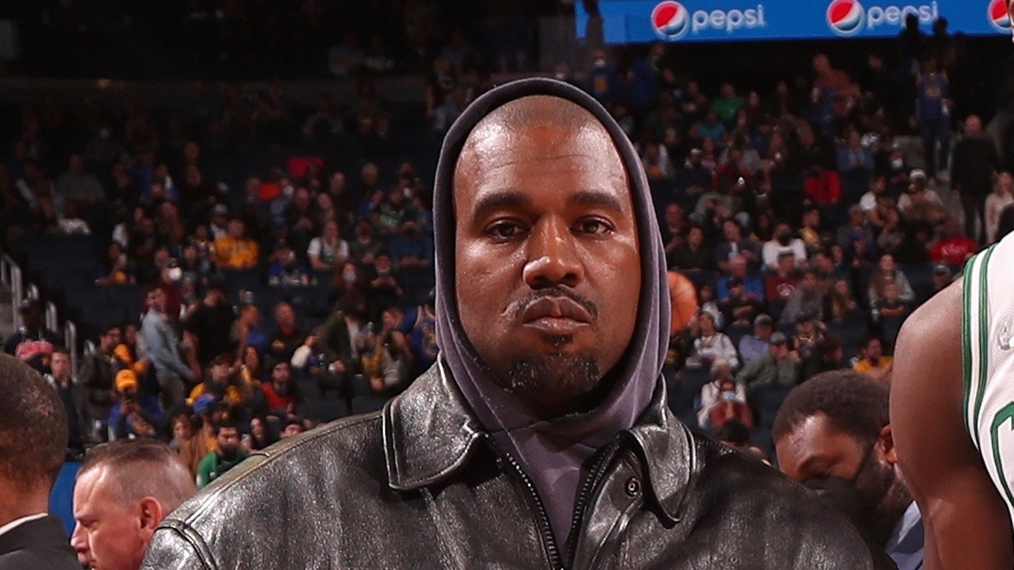 Kanye West poses for a photo with Jaylen Brown #7 of the Boston Celtics
