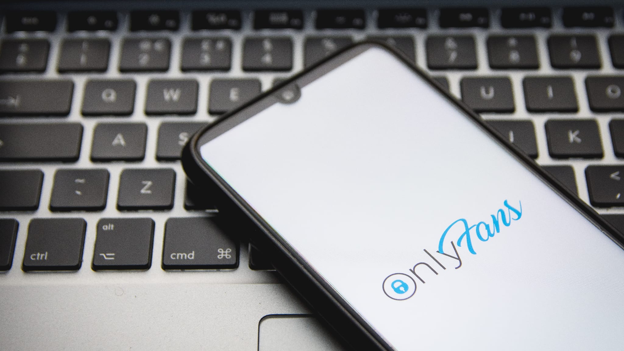 OnlyFans logo displayed on a smartphone screen.