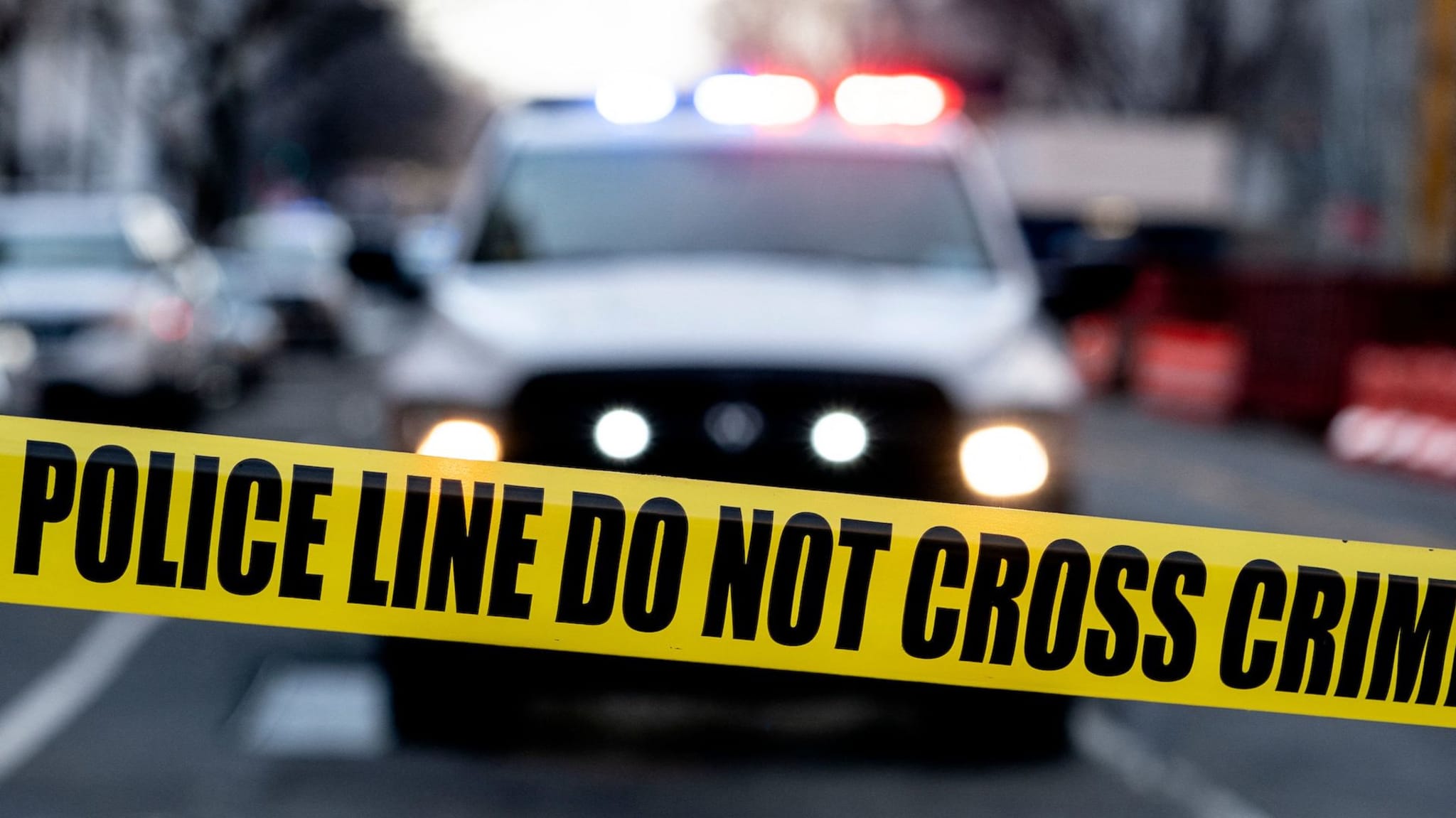 Photograph of police tape crime scene