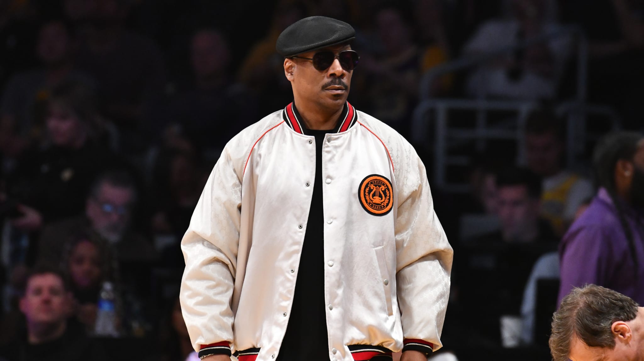 Eddie Murphy attends an NBA game.