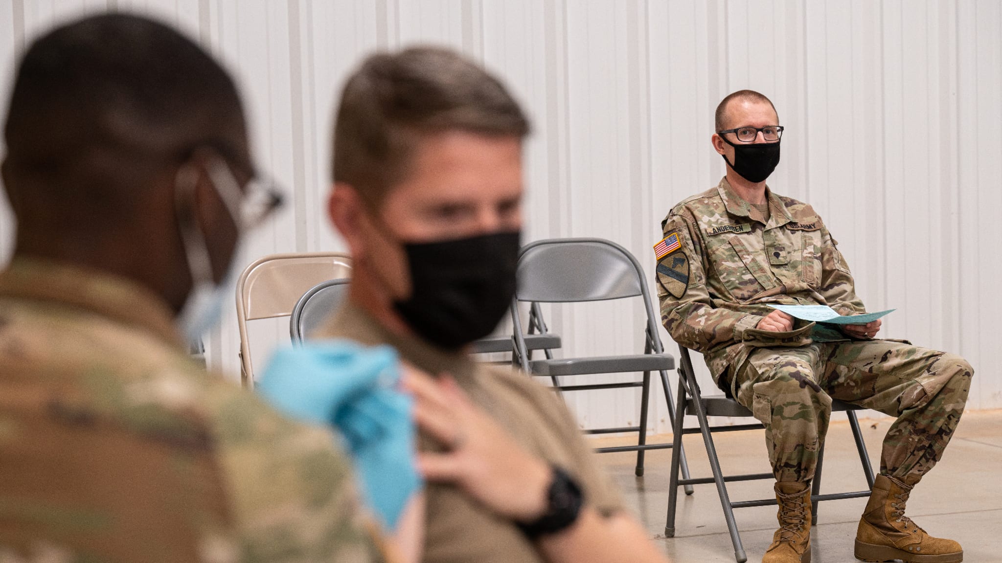 Soldiers taking the Covid vaccine.